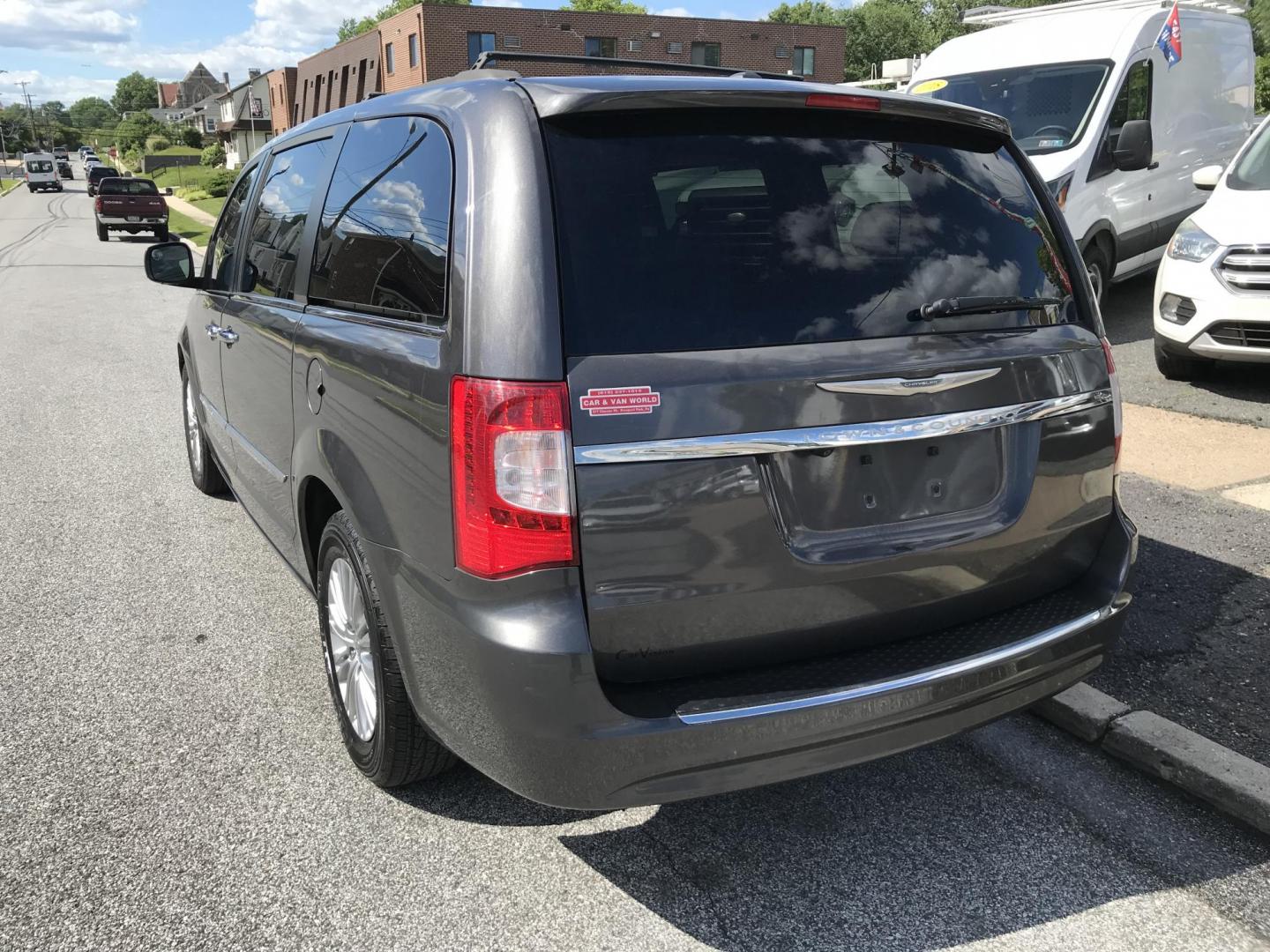 2016 Gray /Black Chrysler Town & Country Touring-L (2C4RC1CG6GR) with an 3.6L V6 DOHC 24V engine, 6A transmission, located at 577 Chester Pike, Prospect Park, PA, 19076, (610) 237-1015, 39.886154, -75.302338 - 2016 Chrysler Town & Country L: Only 127k miles, backup camera, DVD player, Stow and Go Seating, new PA inspection, runs LIKE NEW! This vehicle comes inspected and has been given a bumper to bumper safety check. It is very clean, reliable, and well maintained. We offer a unique pay plan that is k - Photo#5