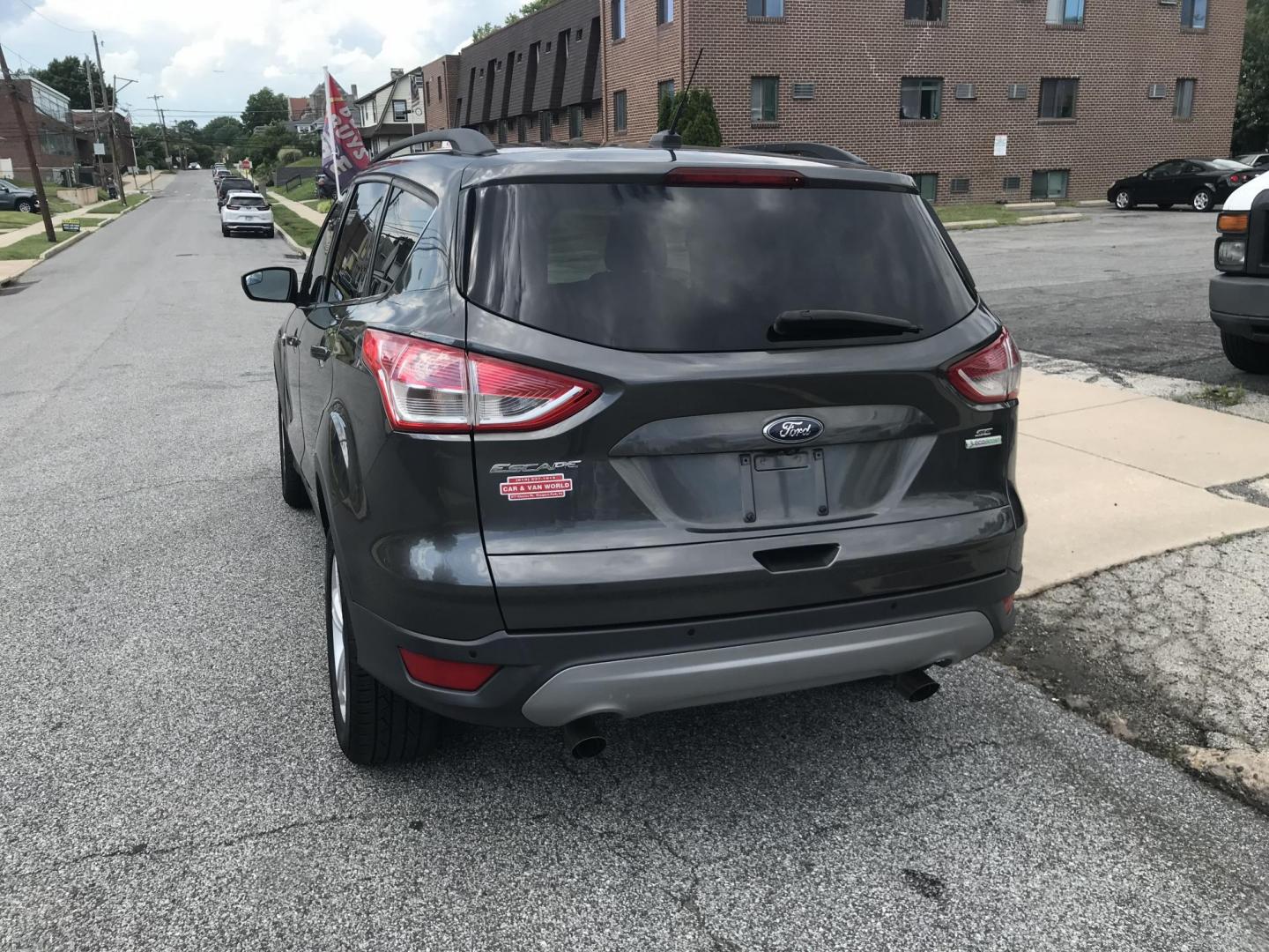 2016 Gray /Gray Ford Escape SE (1FMCU0GX3GU) with an 1.6L L4 DOHC 16V engine, 6-Speed Automatic transmission, located at 577 Chester Pike, Prospect Park, PA, 19076, (610) 237-1015, 39.886154, -75.302338 - 2016 Ford Escape SE: Only 108k miles, new PA inspection, backup camera, SUPER CLEAN, runs LIKE NEW! This vehicle comes inspected and has been given a bumper to bumper safety check. It is very clean, reliable, and well maintained. We offer a unique pay plan that is known for being the easiest and- Photo#5