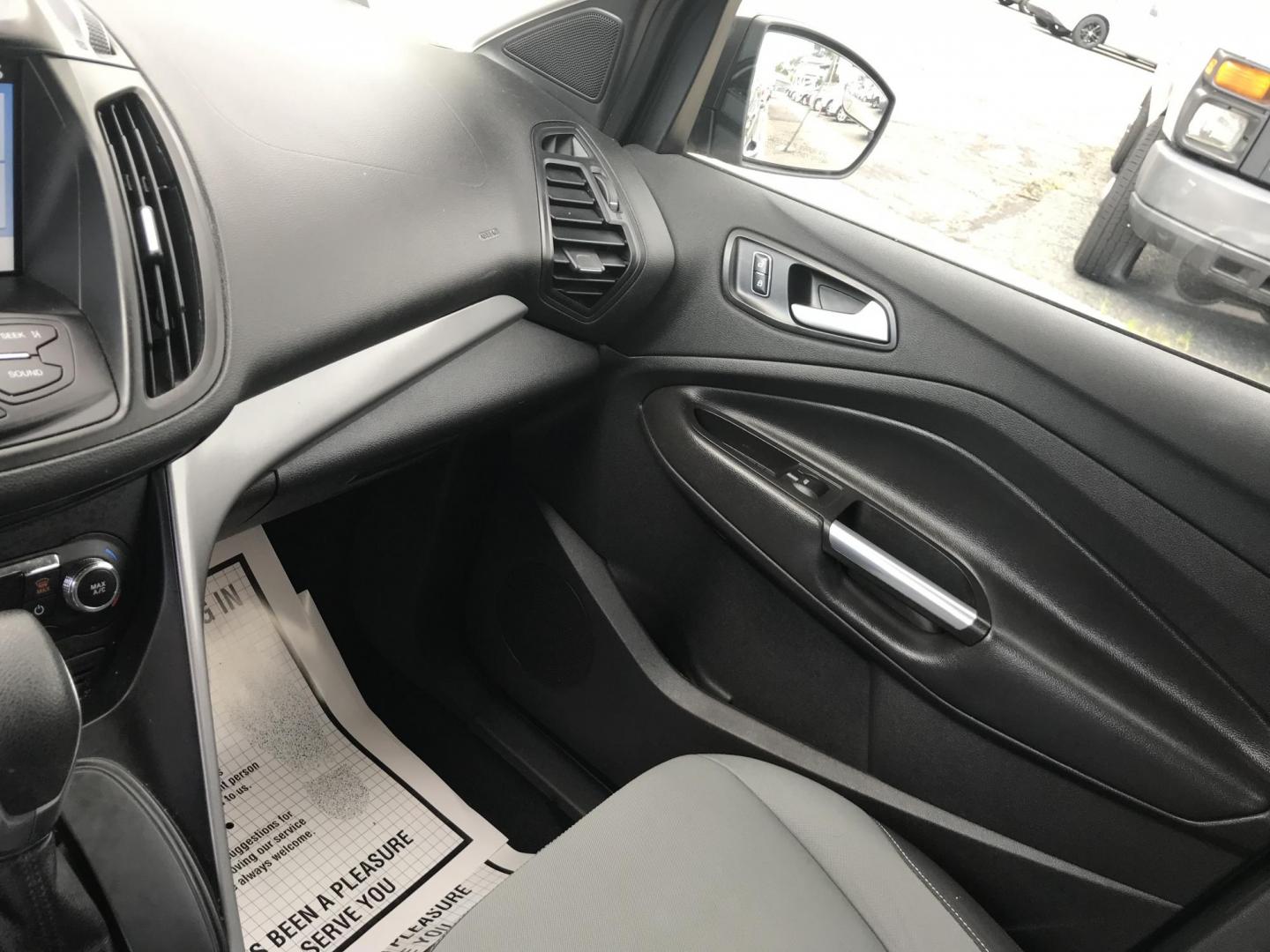 2016 Gray /Gray Ford Escape SE (1FMCU0GX3GU) with an 1.6L L4 DOHC 16V engine, 6-Speed Automatic transmission, located at 577 Chester Pike, Prospect Park, PA, 19076, (610) 237-1015, 39.886154, -75.302338 - 2016 Ford Escape SE: Only 108k miles, new PA inspection, backup camera, SUPER CLEAN, runs LIKE NEW! This vehicle comes inspected and has been given a bumper to bumper safety check. It is very clean, reliable, and well maintained. We offer a unique pay plan that is known for being the easiest and- Photo#16