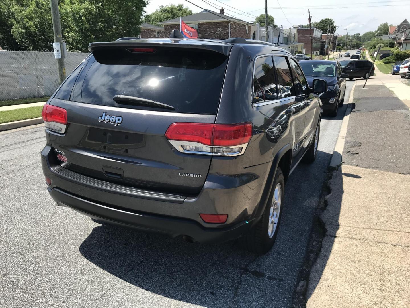 2014 Gray /Black Jeep Grand Cherokee Laredo 4WD (1C4RJFAG5EC) with an 3.6L V6 DOHC 24V engine, 5-Speed Automatic transmission, located at 577 Chester Pike, Prospect Park, PA, 19076, (610) 237-1015, 39.886154, -75.302338 - 2014 Jeep Grand Cherokee Sunroof • New PA Inspection. Example Financing: • $3,500 Down • $100 Weekly • $200 Bi-Weekly We finance our own vehicles. We do not obtain or review traditional consumer credit reports. Financing decisions are based on verified income, ability to repay, and our- Photo#4