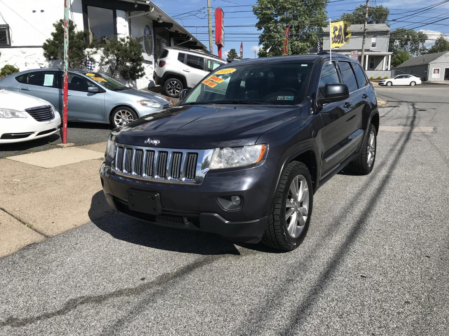 2013 Gray /Black Jeep Grand Cherokee Laredo 4WD (1C4RJFAG6DC) with an 3.6L V6 DOHC 24V engine, 5-Speed Automatic transmission, located at 577 Chester Pike, Prospect Park, PA, 19076, (610) 237-1015, 39.886154, -75.302338 - 2013 Jeep Grand Cherokee Laredo: Backup camera, new PA inspection, SUPER CLEAN, runs LIKE NEW! This vehicle comes inspected and has been given a bumper to bumper safety check. It is very clean, reliable, and well maintained. We offer a unique pay plan that is known for being the easiest and faste- Photo#2