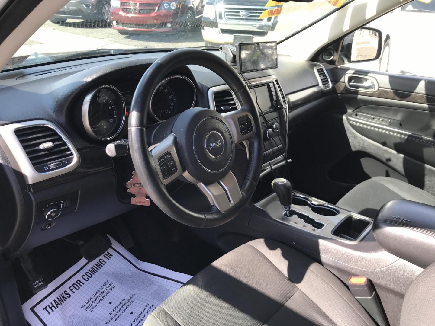 2013 Gray /Black Jeep Grand Cherokee Laredo 4WD (1C4RJFAG6DC) with an 3.6L V6 DOHC 24V engine, 5-Speed Automatic transmission, located at 577 Chester Pike, Prospect Park, PA, 19076, (610) 237-1015, 39.886154, -75.302338 - 2013 Jeep Grand Cherokee Laredo: Backup camera, new PA inspection, SUPER CLEAN, runs LIKE NEW! This vehicle comes inspected and has been given a bumper to bumper safety check. It is very clean, reliable, and well maintained. We offer a unique pay plan that is known for being the easiest and faste- Photo#10