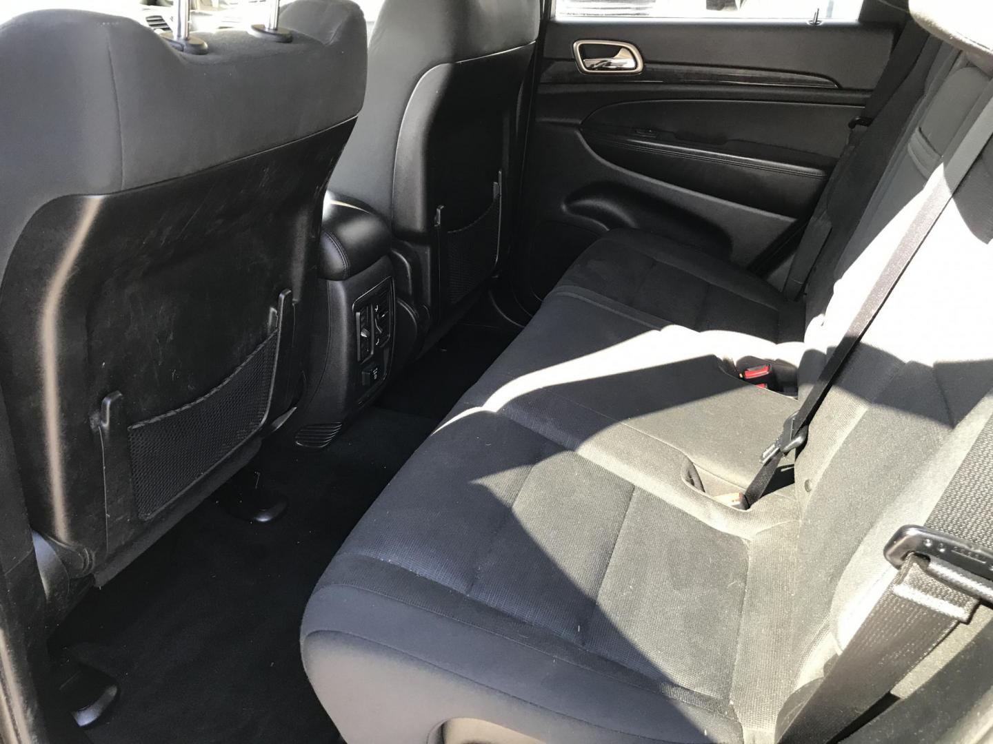 2013 Gray /Black Jeep Grand Cherokee Laredo 4WD (1C4RJFAG6DC) with an 3.6L V6 DOHC 24V engine, 5-Speed Automatic transmission, located at 577 Chester Pike, Prospect Park, PA, 19076, (610) 237-1015, 39.886154, -75.302338 - 2013 Jeep Grand Cherokee Laredo: Backup camera, new PA inspection, SUPER CLEAN, runs LIKE NEW! This vehicle comes inspected and has been given a bumper to bumper safety check. It is very clean, reliable, and well maintained. We offer a unique pay plan that is known for being the easiest and faste- Photo#16