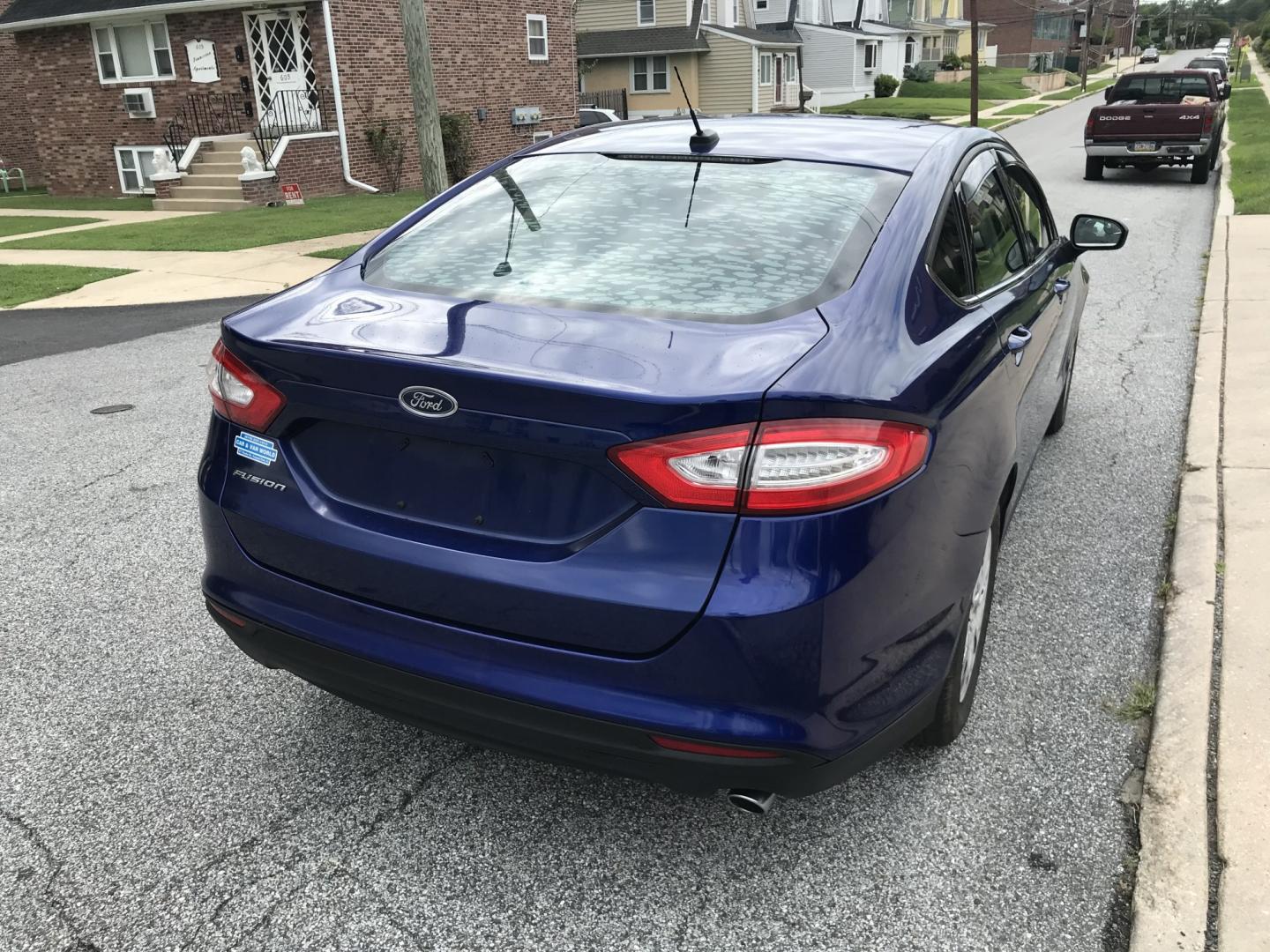 2014 Blue /Gray Ford Fusion S (1FA6P0G76E5) with an 2.5L L4 DOHC 16V engine, Automatic transmission, located at 577 Chester Pike, Prospect Park, PA, 19076, (610) 237-1015, 39.886154, -75.302338 - 2015 Ford Fusion Great on Gas • New PA Inspection. Example Financing: • $2,500 Down • $100 Weekly • $200 Bi-Weekly We finance our own vehicles. We do not obtain or review traditional consumer credit reports. Financing decisions are based on verified income, ability to repay, and our in- Photo#3