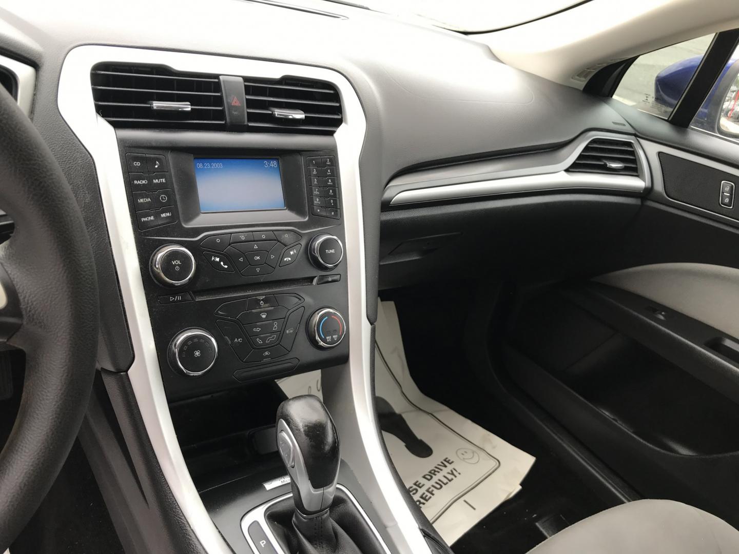 2014 Blue /Gray Ford Fusion S (1FA6P0G76E5) with an 2.5L L4 DOHC 16V engine, Automatic transmission, located at 577 Chester Pike, Prospect Park, PA, 19076, (610) 237-1015, 39.886154, -75.302338 - 2015 Ford Fusion Great on Gas • New PA Inspection. Example Financing: • $2,500 Down • $100 Weekly • $200 Bi-Weekly We finance our own vehicles. We do not obtain or review traditional consumer credit reports. Financing decisions are based on verified income, ability to repay, and our in- Photo#10