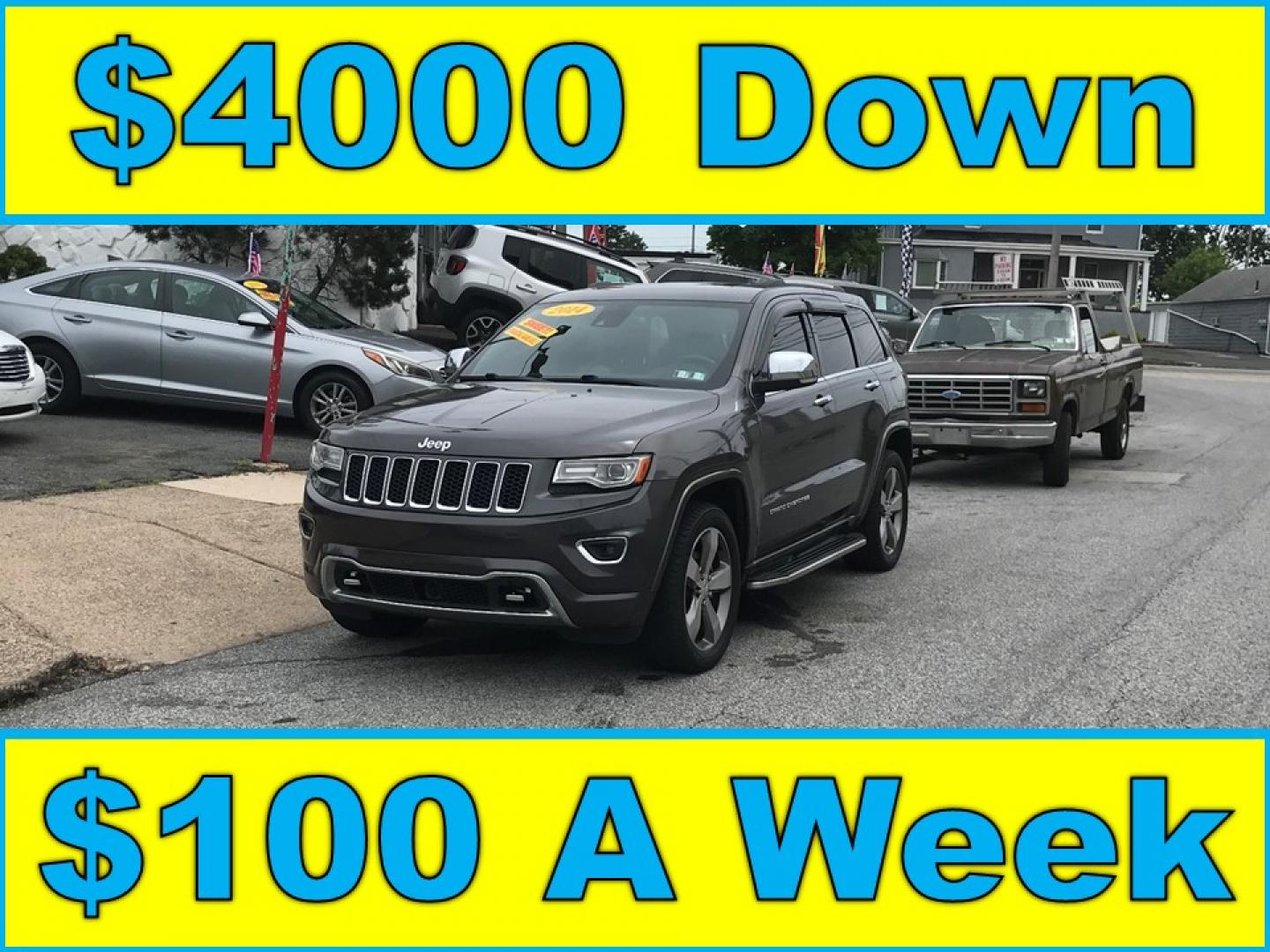 2014 Gray /Black Jeep Grand Cherokee Overland 4WD (1C4RJFCG3EC) with an 3.6L V6 DOHC 24V engine, 5-Speed Automatic transmission, located at 577 Chester Pike, Prospect Park, PA, 19076, (610) 237-1015, 39.886154, -75.302338 - 2014 Jeep Grand Cherokee Overland: 4x4, backup camera, navigation system, sunroof, new PA inspection, SUPER CLEAN, runs LIKE NEW! This vehicle comes inspected and has been given a bumper to bumper safety check. I4 is very clean, reliable, and well maintained. We offer a unique pay plan that is kn - Photo#0