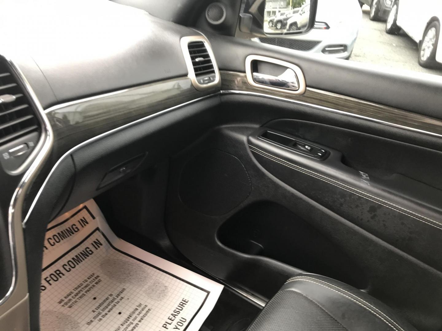 2014 Gray /Black Jeep Grand Cherokee Overland 4WD (1C4RJFCG3EC) with an 3.6L V6 DOHC 24V engine, 5-Speed Automatic transmission, located at 577 Chester Pike, Prospect Park, PA, 19076, (610) 237-1015, 39.886154, -75.302338 - 2014 Jeep Grand Cherokee Overland: 4x4, backup camera, navigation system, sunroof, new PA inspection, SUPER CLEAN, runs LIKE NEW! This vehicle comes inspected and has been given a bumper to bumper safety check. I4 is very clean, reliable, and well maintained. We offer a unique pay plan that is kn - Photo#18