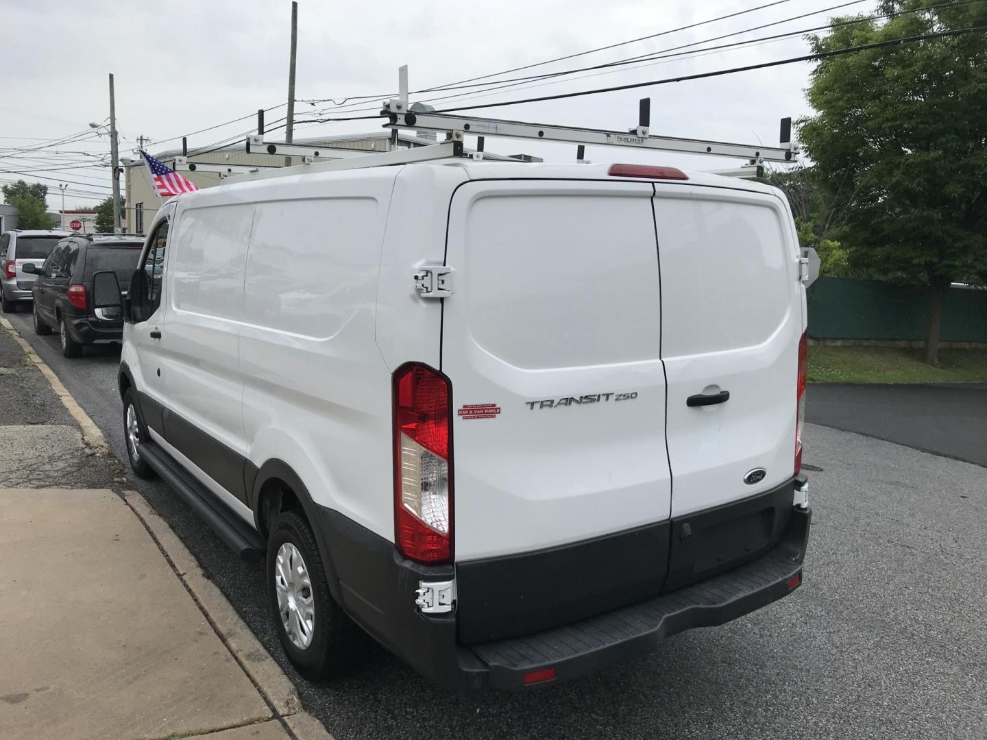 2016 White /Gray Ford Transit 250 Van Low Roof 60/40 Pass.130-in. WB (1FTYR1ZM8GK) with an 3.7L V6 DOHC 24V engine, 6A transmission, located at 577 Chester Pike, Prospect Park, PA, 19076, (610) 237-1015, 39.886154, -75.302338 - 2016 Ford Transit 250: Ladder racks, shelving, backup camera, new PA inspection, FLEET MAINTAINED, runs LIKE NEW! This vehicle comes inspected and has been given a bumper to bumper safety check. It is very clean, reliable, and well maintained. We offer a unique pay plan that is known for being th - Photo#4