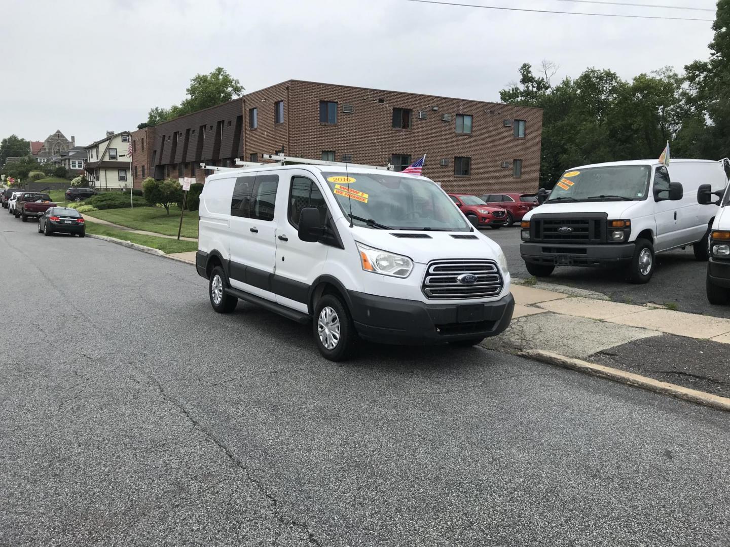 2016 White /Gray Ford Transit 250 Van Low Roof 60/40 Pass.130-in. WB (1FTYR1ZM8GK) with an 3.7L V6 DOHC 24V engine, 6A transmission, located at 577 Chester Pike, Prospect Park, PA, 19076, (610) 237-1015, 39.886154, -75.302338 - 2016 Ford Transit 250: Ladder racks, shelving, backup camera, new PA inspection, FLEET MAINTAINED, runs LIKE NEW! This vehicle comes inspected and has been given a bumper to bumper safety check. It is very clean, reliable, and well maintained. We offer a unique pay plan that is known for being th - Photo#1