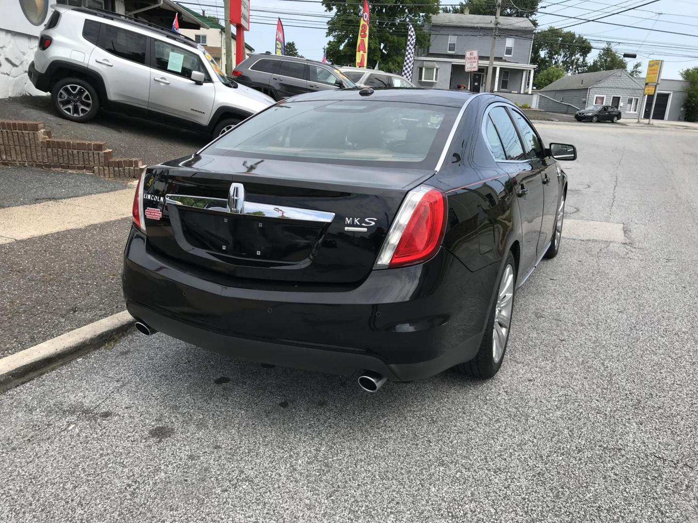 2011 Black /Black Lincoln MKS 3.5L with EcoBoost AWD (1LNHL9FT4BG) with an 3.5L V6 DOHC 24V engine, 6-Speed Automatic transmission, located at 577 Chester Pike, Prospect Park, PA, 19076, (610) 237-1015, 39.886154, -75.302338 - 2011 Lincoln MKS: Navigation system, AWD, backup camera, new PA inspection, SUPER CLEAN, runs LIKE NEW! This vehicle comes inspected and has been given a bumper to bumper safety check. It is very clean, reliable, and well maintained. We offer a unique pay plan that is known for being the easiest- Photo#5