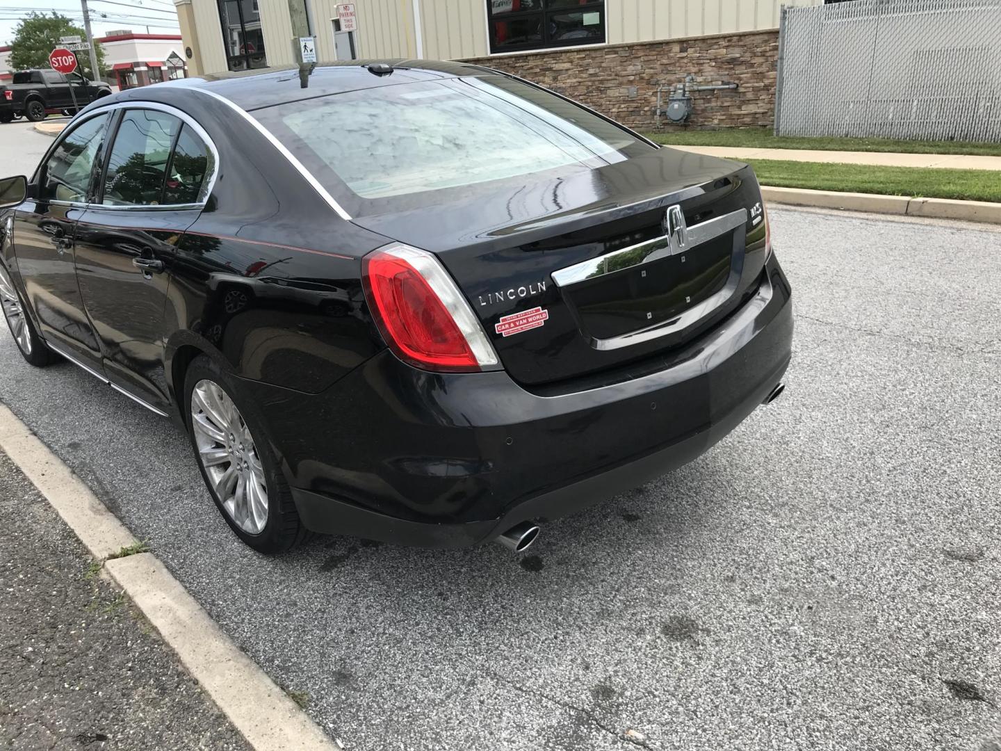 2011 Black /Black Lincoln MKS 3.5L with EcoBoost AWD (1LNHL9FT4BG) with an 3.5L V6 DOHC 24V engine, 6-Speed Automatic transmission, located at 577 Chester Pike, Prospect Park, PA, 19076, (610) 237-1015, 39.886154, -75.302338 - 2011 Lincoln MKS: Navigation system, AWD, backup camera, new PA inspection, SUPER CLEAN, runs LIKE NEW! This vehicle comes inspected and has been given a bumper to bumper safety check. It is very clean, reliable, and well maintained. We offer a unique pay plan that is known for being the easiest- Photo#4