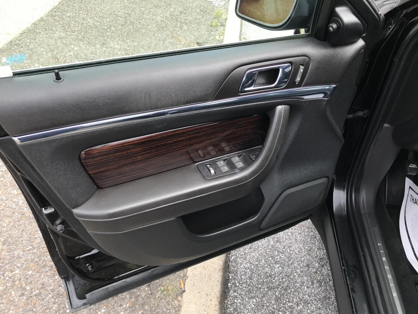 2011 Black /Black Lincoln MKS 3.5L with EcoBoost AWD (1LNHL9FT4BG) with an 3.5L V6 DOHC 24V engine, 6-Speed Automatic transmission, located at 577 Chester Pike, Prospect Park, PA, 19076, (610) 237-1015, 39.886154, -75.302338 - 2011 Lincoln MKS: Navigation system, AWD, backup camera, new PA inspection, SUPER CLEAN, runs LIKE NEW! This vehicle comes inspected and has been given a bumper to bumper safety check. It is very clean, reliable, and well maintained. We offer a unique pay plan that is known for being the easiest- Photo#7