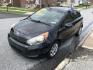 2015 Black /Tan Kia Rio LX (KNADM5A39F6) with an 1.6 V4 engine, Automatic transmission, located at 577 Chester Pike, Prospect Park, PA, 19076, (610) 237-1015, 39.886154, -75.302338 - 2015 Kia Rio LX: Only 133k miles, new PA inspection, great on gas, SUPER CLEAN, runs LIKE NEW! This vehicle comes inspected and has been given a bumper to bumper safety check. It is very clean, reliable, and well maintained. We offer a unique pay plan that is known for being the easiest and faste- Photo#3