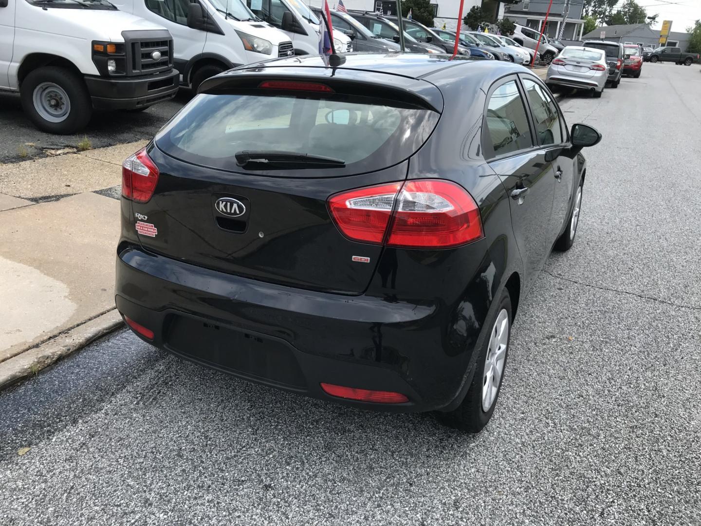 2015 Black /Tan Kia Rio LX (KNADM5A39F6) with an 1.6 V4 engine, Automatic transmission, located at 577 Chester Pike, Prospect Park, PA, 19076, (610) 237-1015, 39.886154, -75.302338 - 2015 Kia Rio LX: Only 133k miles, new PA inspection, great on gas, SUPER CLEAN, runs LIKE NEW! This vehicle comes inspected and has been given a bumper to bumper safety check. It is very clean, reliable, and well maintained. We offer a unique pay plan that is known for being the easiest and faste- Photo#6