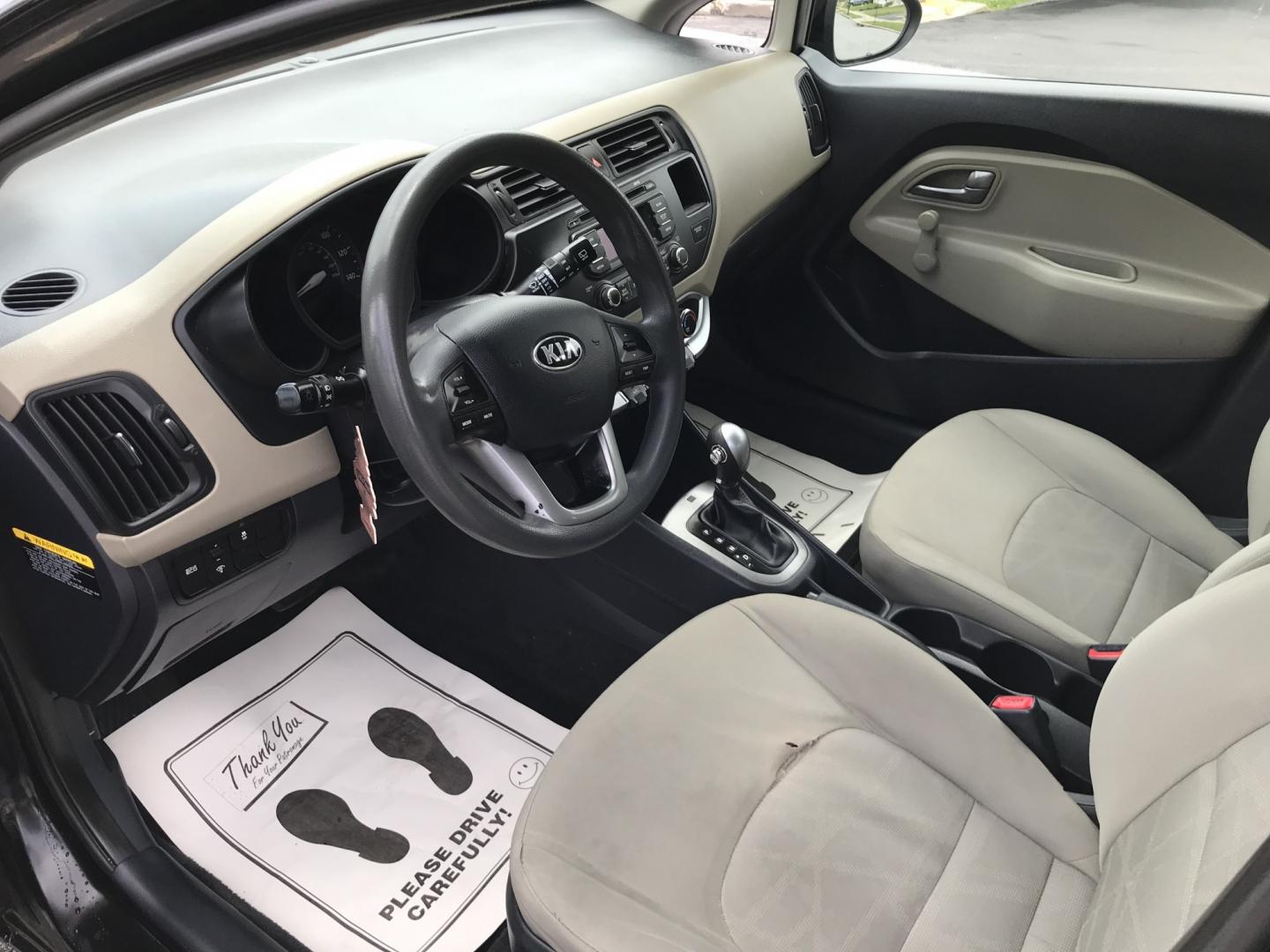 2015 Black /Tan Kia Rio LX (KNADM5A39F6) with an 1.6 V4 engine, Automatic transmission, located at 577 Chester Pike, Prospect Park, PA, 19076, (610) 237-1015, 39.886154, -75.302338 - 2015 Kia Rio LX: Only 133k miles, new PA inspection, great on gas, SUPER CLEAN, runs LIKE NEW! This vehicle comes inspected and has been given a bumper to bumper safety check. It is very clean, reliable, and well maintained. We offer a unique pay plan that is known for being the easiest and faste- Photo#7