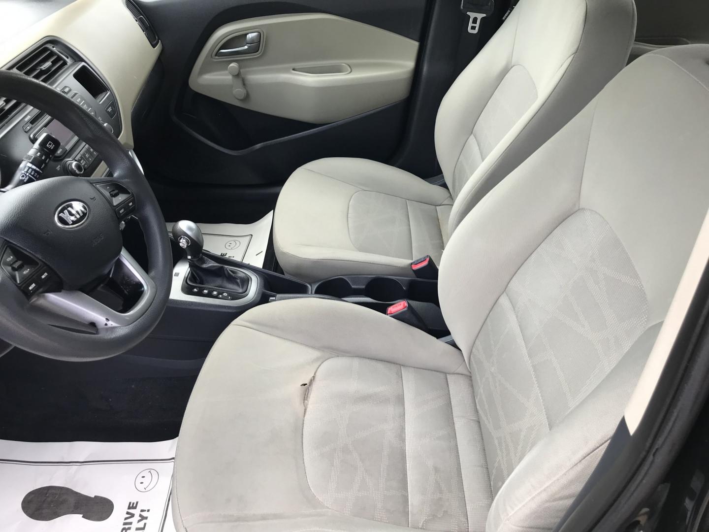 2015 Black /Tan Kia Rio LX (KNADM5A39F6) with an 1.6 V4 engine, Automatic transmission, located at 577 Chester Pike, Prospect Park, PA, 19076, (610) 237-1015, 39.886154, -75.302338 - 2015 Kia Rio LX: Only 133k miles, new PA inspection, great on gas, SUPER CLEAN, runs LIKE NEW! This vehicle comes inspected and has been given a bumper to bumper safety check. It is very clean, reliable, and well maintained. We offer a unique pay plan that is known for being the easiest and faste- Photo#9