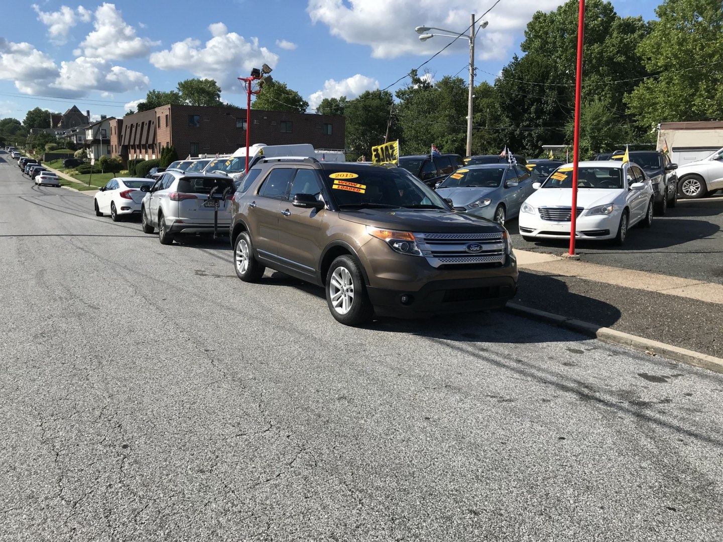 2015 Brown /Gray Ford Explorer XLT 4WD (1FM5K8D81FG) with an 3.5L V6 DOHC 24V engine, 6-Speed Automatic transmission, located at 577 Chester Pike, Prospect Park, PA, 19076, (610) 237-1015, 39.886154, -75.302338 - 2015 Ford Explorer XLT: Backup camera, 3rd row seating, 4x4, SUPER CLEAN, runs LIKE NEW! This vehicle comes inspected and has been given a bumper to bumper safety check. It is very clean, reliable, and well maintained. We offer a unique pay plan that is known for being the easiest and fastest fin- Photo#1