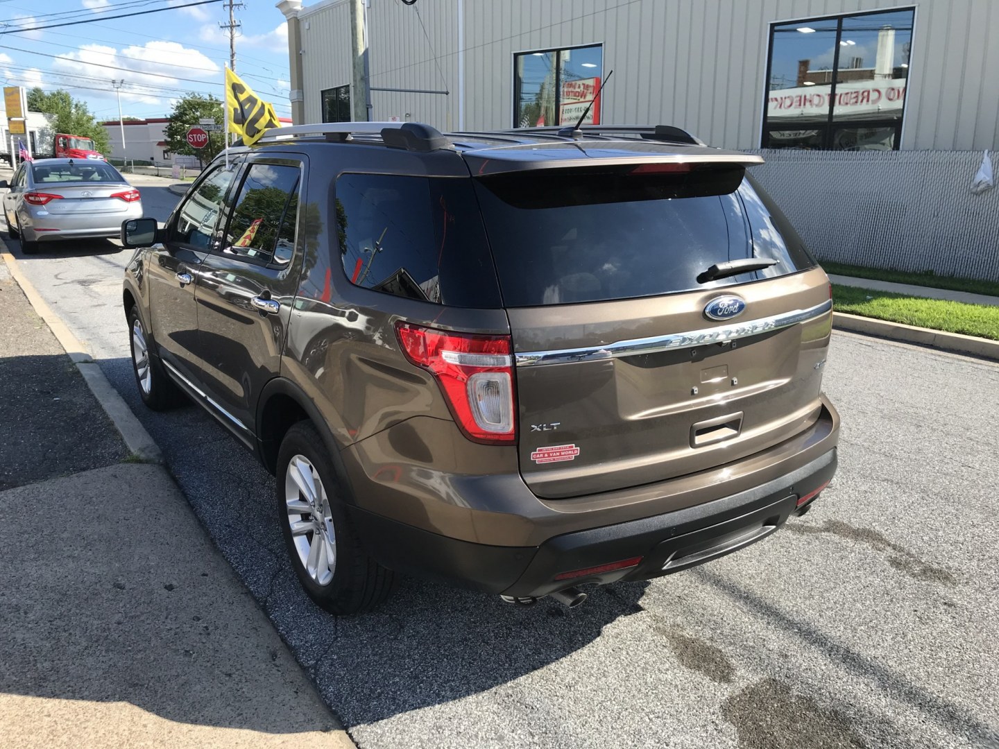 2015 Brown /Gray Ford Explorer XLT 4WD (1FM5K8D81FG) with an 3.5L V6 DOHC 24V engine, 6-Speed Automatic transmission, located at 577 Chester Pike, Prospect Park, PA, 19076, (610) 237-1015, 39.886154, -75.302338 - 2015 Ford Explorer XLT: Backup camera, 3rd row seating, 4x4, SUPER CLEAN, runs LIKE NEW! This vehicle comes inspected and has been given a bumper to bumper safety check. It is very clean, reliable, and well maintained. We offer a unique pay plan that is known for being the easiest and fastest fin- Photo#4