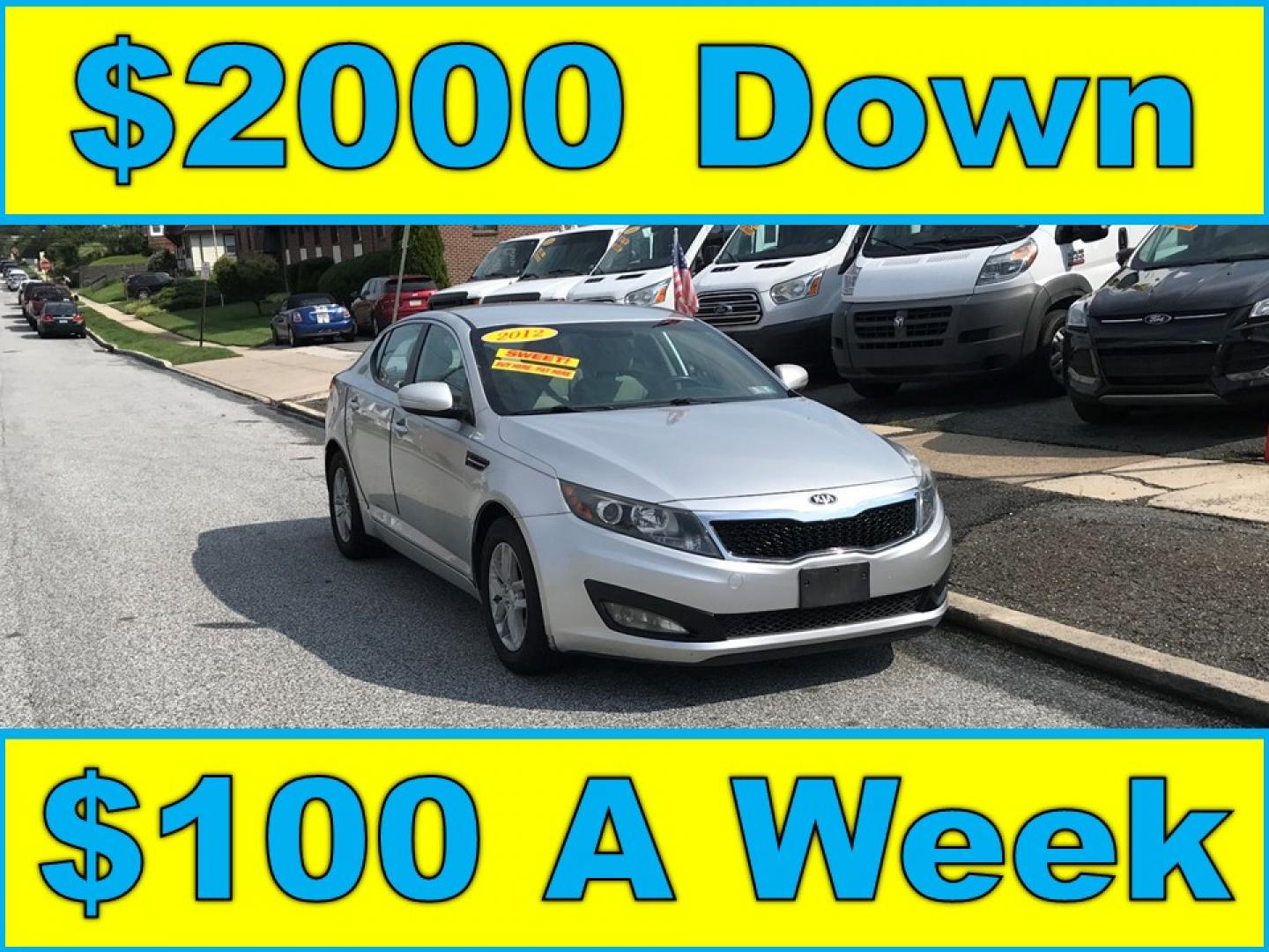 2012 Silver /Gray Kia Optima LX MT (KNAGM4A77C5) with an 2.4L L4 DOHC 16V engine, Automatic transmission, located at 577 Chester Pike, Prospect Park, PA, 19076, (610) 237-1015, 39.886154, -75.302338 - 2012 Kia Optima LX: Only 101k miles, great on gas, new PA inspection, SUPER CLEAN, runs LIKE NEW! This vehicle comes inspected and has been given a bumper to bumper safety check. It is very clean, reliable, and well maintained. We offer a unique pay plan that is known for being the easiest and fa- Photo#0