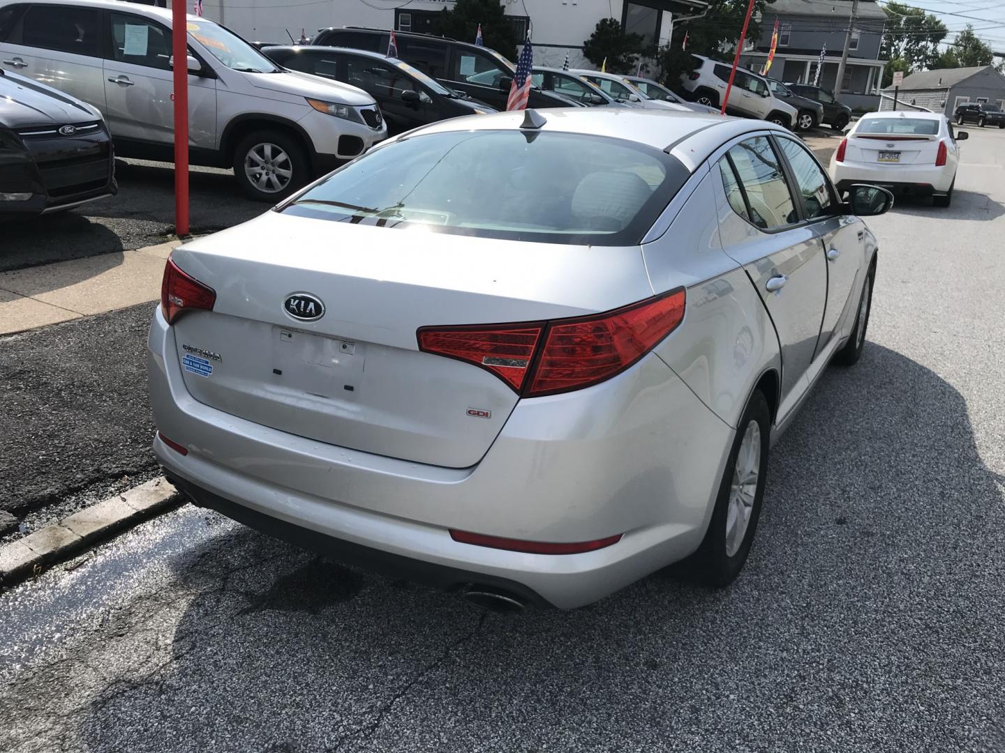 2012 Silver /Gray Kia Optima LX MT (KNAGM4A77C5) with an 2.4L L4 DOHC 16V engine, Automatic transmission, located at 577 Chester Pike, Prospect Park, PA, 19076, (610) 237-1015, 39.886154, -75.302338 - 2012 Kia Optima LX: Only 101k miles, great on gas, new PA inspection, SUPER CLEAN, runs LIKE NEW! This vehicle comes inspected and has been given a bumper to bumper safety check. It is very clean, reliable, and well maintained. We offer a unique pay plan that is known for being the easiest and fa- Photo#6