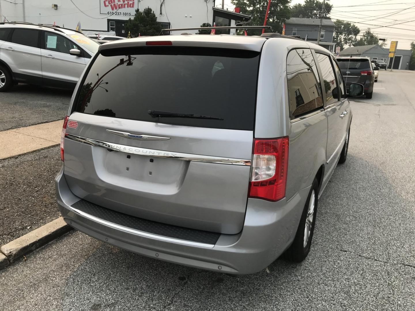 2015 Silver /Black Chrysler Town & Country Touring-L (2C4RC1CG4FR) with an 3.6L V6 DOHC 24V engine, 6A transmission, located at 577 Chester Pike, Prospect Park, PA, 19076, (610) 237-1015, 39.886154, -75.302338 - 2015 Chrylser Town & Country L 91k miles • Stow N Go Seating Example Financing: • $3,500 Down • $100 Weekly • $200 Bi-Weekly We finance our own vehicles. We do not obtain or review traditional consumer credit reports. Financing decisions are based on verified income, ability to repay,- Photo#5