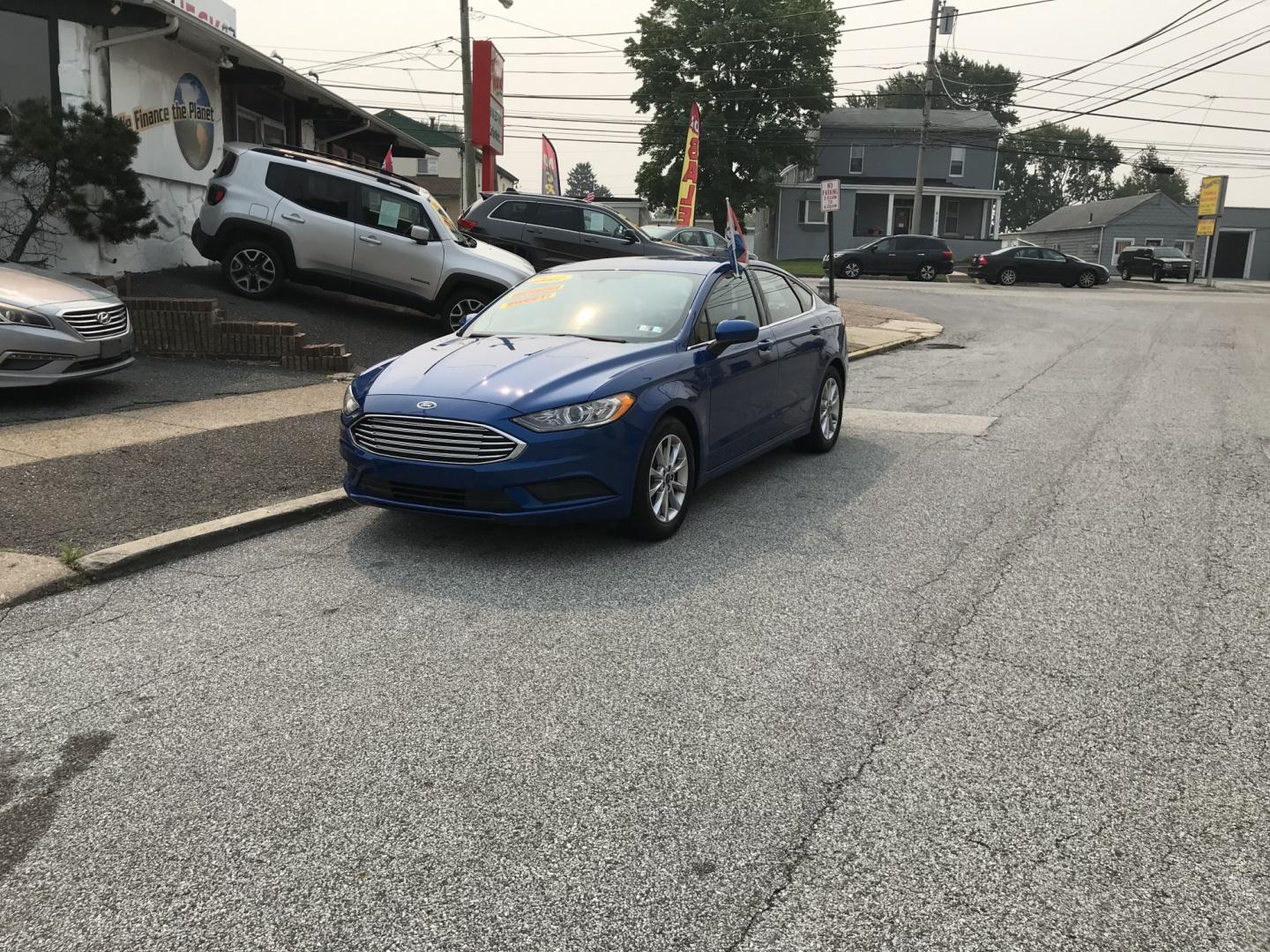 2017 Blue /Gray Ford Fusion SE (3FA6P0HD4HR) with an 1.5L L4 DOHC 16V engine, 6A transmission, located at 577 Chester Pike, Prospect Park, PA, 19076, (610) 237-1015, 39.886154, -75.302338 - 2017 Ford Fusion 124k Miles • Backup Camera. Example Financing: • $3,000 Down • $100 Weekly • $200 Bi-Weekly We finance our own vehicles. We do not obtain or review traditional consumer credit reports. Financing decisions are based on verified income, ability to repay, and our in-house- Photo#1