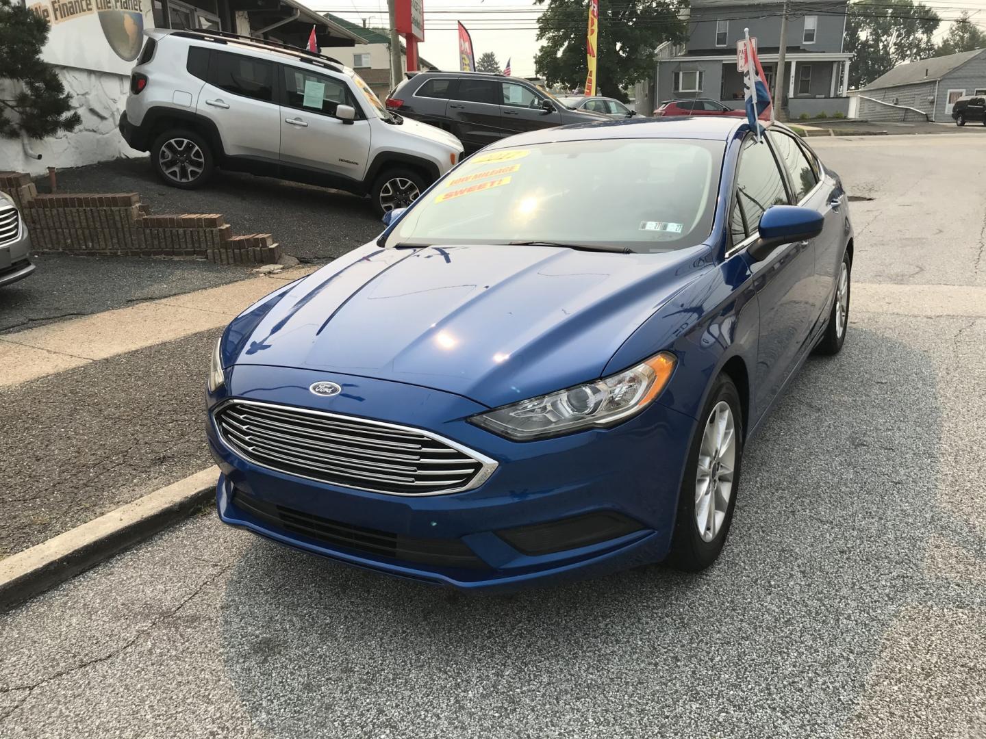 2017 Blue /Gray Ford Fusion SE (3FA6P0HD4HR) with an 1.5L L4 DOHC 16V engine, 6A transmission, located at 577 Chester Pike, Prospect Park, PA, 19076, (610) 237-1015, 39.886154, -75.302338 - 2017 Ford Fusion 124k Miles • Backup Camera. Example Financing: • $3,000 Down • $100 Weekly • $200 Bi-Weekly We finance our own vehicles. We do not obtain or review traditional consumer credit reports. Financing decisions are based on verified income, ability to repay, and our in-house- Photo#2