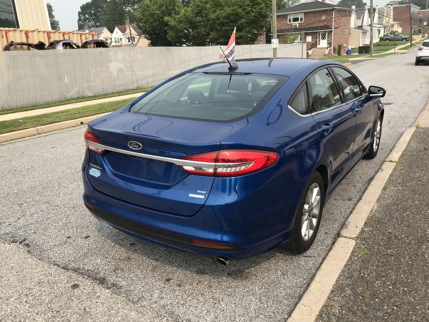 2017 Blue /Gray Ford Fusion SE (3FA6P0HD4HR) with an 1.5L L4 DOHC 16V engine, 6A transmission, located at 577 Chester Pike, Prospect Park, PA, 19076, (610) 237-1015, 39.886154, -75.302338 - 2017 Ford Fusion 124k Miles • Backup Camera. Example Financing: • $3,000 Down • $100 Weekly • $200 Bi-Weekly We finance our own vehicles. We do not obtain or review traditional consumer credit reports. Financing decisions are based on verified income, ability to repay, and our in-house- Photo#4