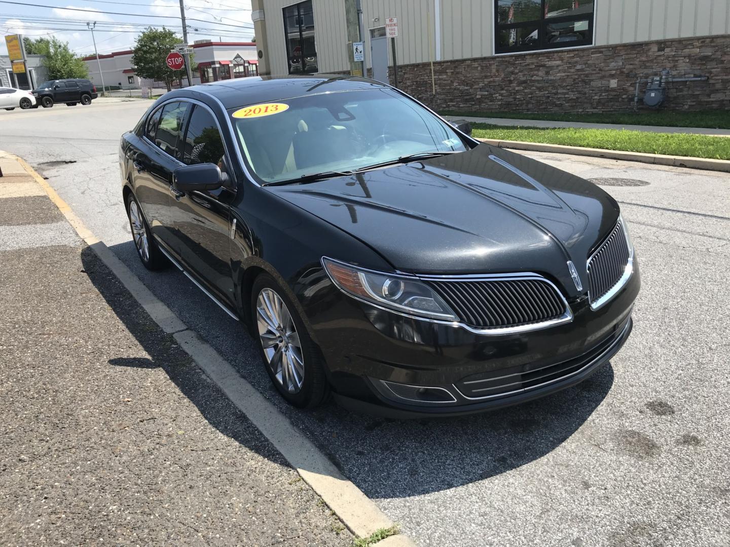2013 Black /Tan Lincoln MKS EcoBoost AWD (1LNHL9FT6DG) with an 3.5L V6 DOHC 24V engine, 6-Speed Automatic transmission, located at 577 Chester Pike, Prospect Park, PA, 19076, (610) 237-1015, 39.886154, -75.302338 - 2013 Lincoln MKS AWD 118k miles • New PA Inspection. Example Financing: • $2,500 Down • $100 Weekly • $200 Bi-Weekly We finance our own vehicles. We do not obtain or review traditional consumer credit reports. Financing decisions are based on verified income, ability to repay, and our- Photo#3