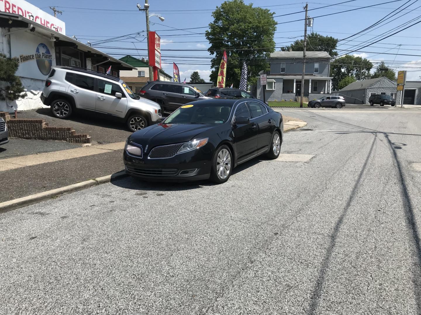 2013 Black /Tan Lincoln MKS EcoBoost AWD (1LNHL9FT6DG) with an 3.5L V6 DOHC 24V engine, 6-Speed Automatic transmission, located at 577 Chester Pike, Prospect Park, PA, 19076, (610) 237-1015, 39.886154, -75.302338 - 2013 Lincoln MKS AWD 118k miles • New PA Inspection. Example Financing: • $2,500 Down • $100 Weekly • $200 Bi-Weekly We finance our own vehicles. We do not obtain or review traditional consumer credit reports. Financing decisions are based on verified income, ability to repay, and our- Photo#1