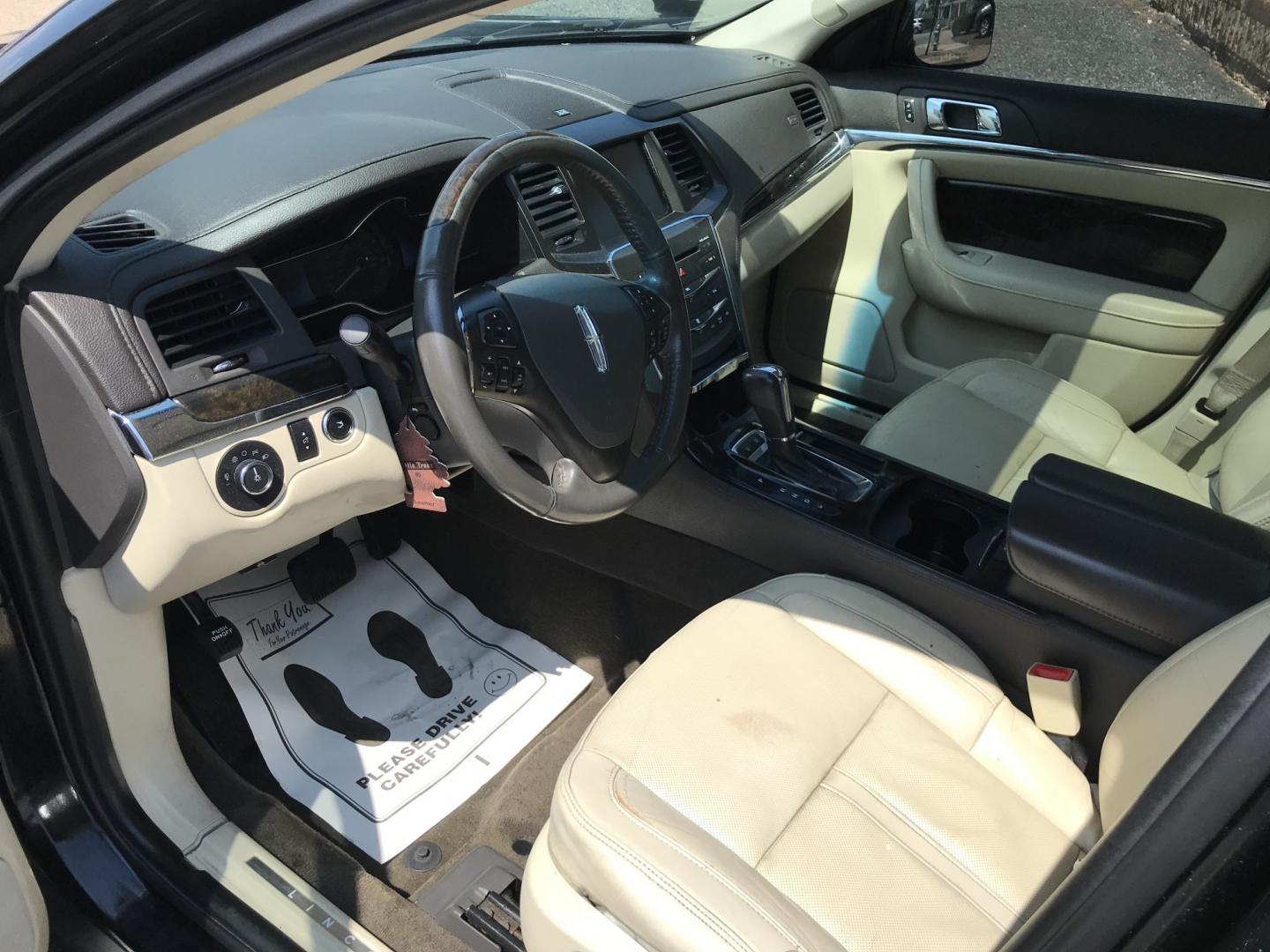 2013 Black /Tan Lincoln MKS EcoBoost AWD (1LNHL9FT6DG) with an 3.5L V6 DOHC 24V engine, 6-Speed Automatic transmission, located at 577 Chester Pike, Prospect Park, PA, 19076, (610) 237-1015, 39.886154, -75.302338 - 2013 Lincoln MKS AWD 118k miles • New PA Inspection. Example Financing: • $2,500 Down • $100 Weekly • $200 Bi-Weekly We finance our own vehicles. We do not obtain or review traditional consumer credit reports. Financing decisions are based on verified income, ability to repay, and our- Photo#7