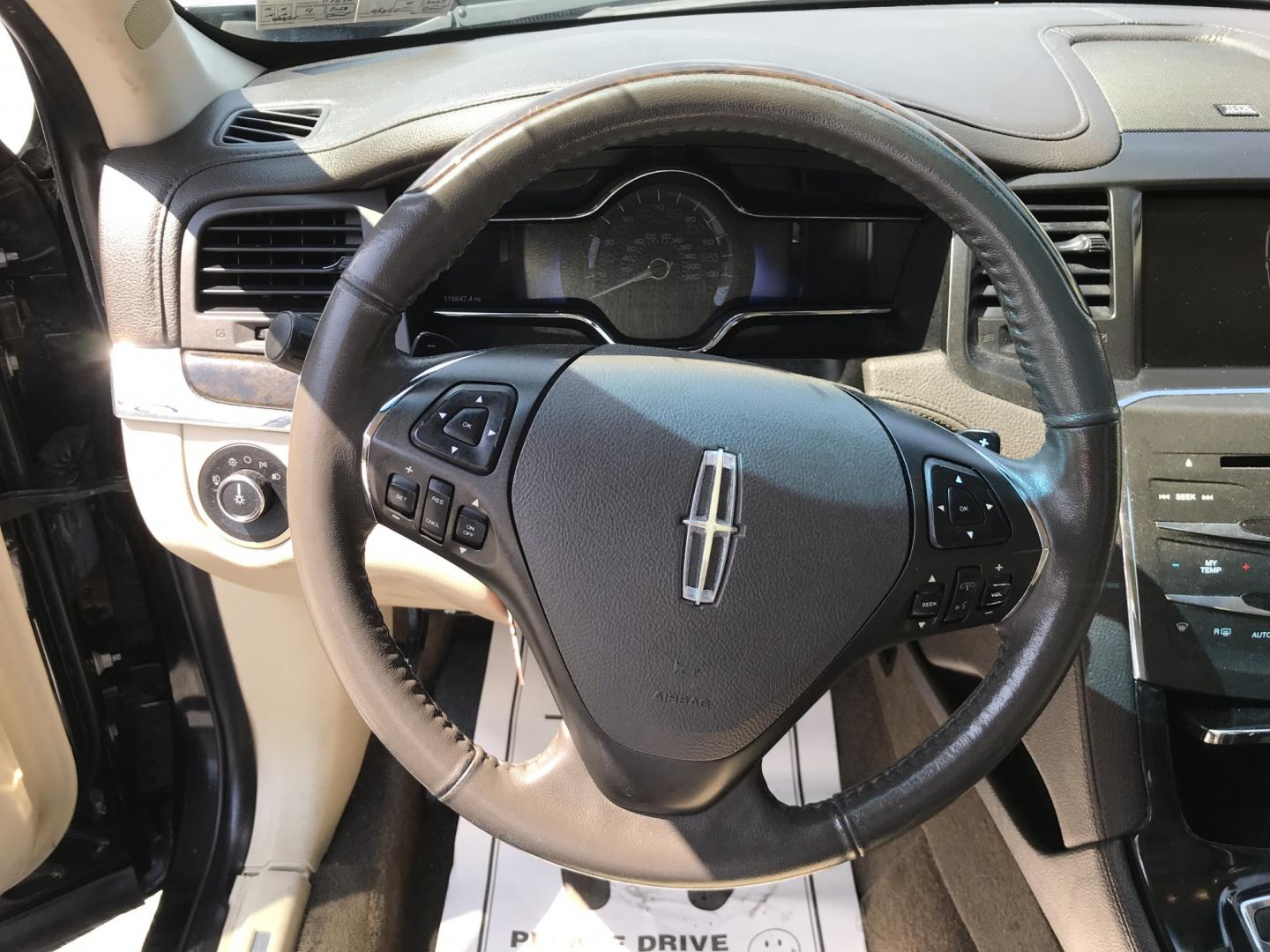 2013 Black /Tan Lincoln MKS EcoBoost AWD (1LNHL9FT6DG) with an 3.5L V6 DOHC 24V engine, 6-Speed Automatic transmission, located at 577 Chester Pike, Prospect Park, PA, 19076, (610) 237-1015, 39.886154, -75.302338 - 2013 Lincoln MKS AWD 118k miles • New PA Inspection. Example Financing: • $2,500 Down • $100 Weekly • $200 Bi-Weekly We finance our own vehicles. We do not obtain or review traditional consumer credit reports. Financing decisions are based on verified income, ability to repay, and our- Photo#11