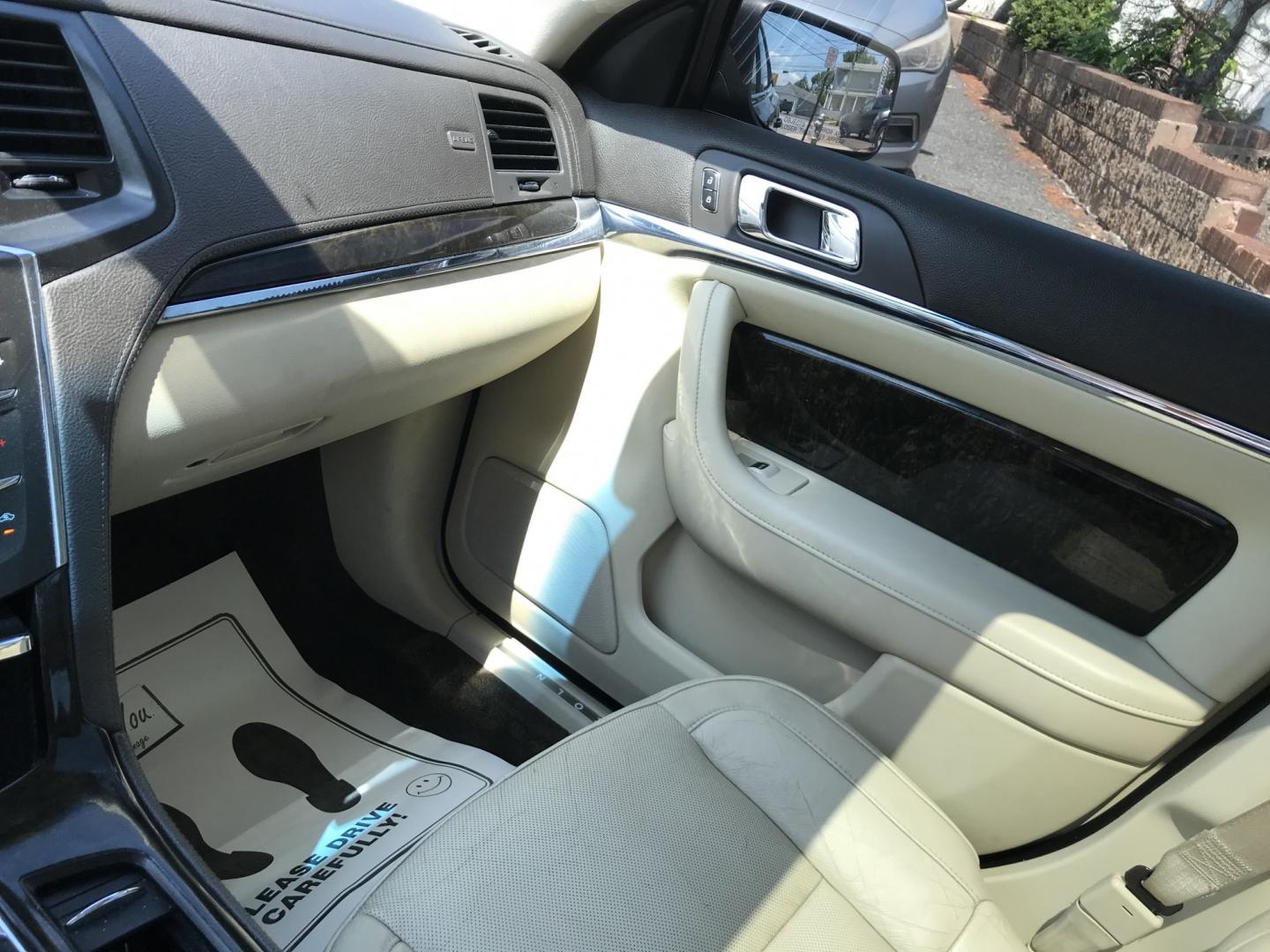 2013 Black /Tan Lincoln MKS EcoBoost AWD (1LNHL9FT6DG) with an 3.5L V6 DOHC 24V engine, 6-Speed Automatic transmission, located at 577 Chester Pike, Prospect Park, PA, 19076, (610) 237-1015, 39.886154, -75.302338 - 2013 Lincoln MKS AWD 118k miles • New PA Inspection. Example Financing: • $2,500 Down • $100 Weekly • $200 Bi-Weekly We finance our own vehicles. We do not obtain or review traditional consumer credit reports. Financing decisions are based on verified income, ability to repay, and our- Photo#14