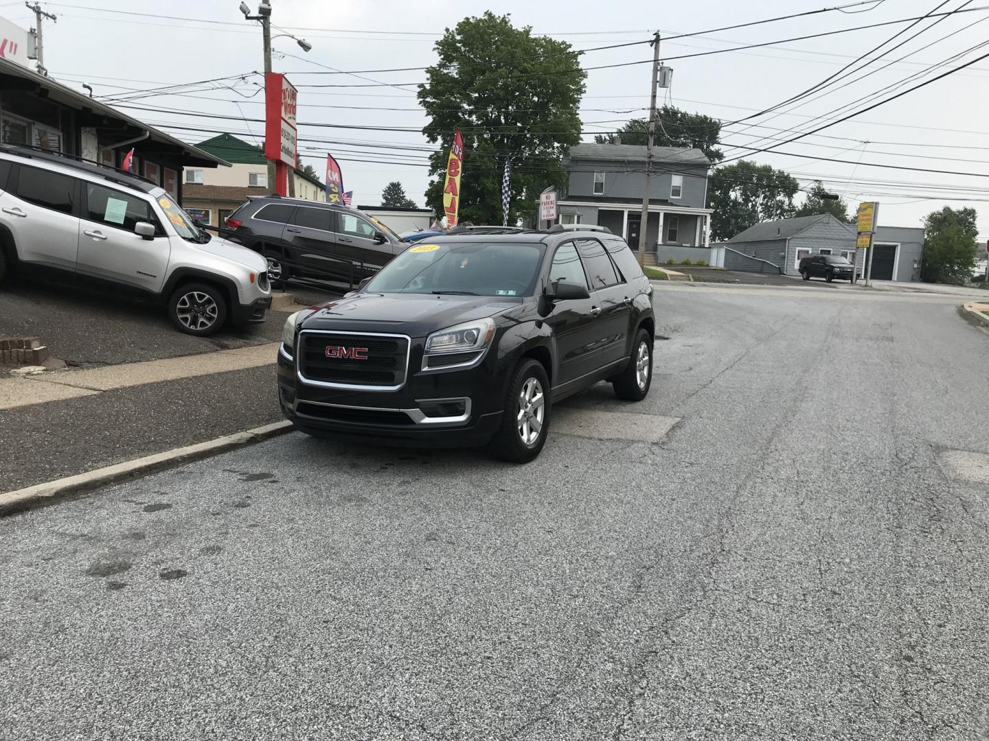 2013 Black /Black GMC Acadia SLE-1 (1GKKRNEDXDJ) with an 3.6L V6 DOHC 24V engine, 6-Speed Automatic transmission, located at 577 Chester Pike, Prospect Park, PA, 19076, (610) 237-1015, 39.886154, -75.302338 - 2013 GMC Acadia SLE 137k miles • 3rd Row Seating. Example Financing: • $2,500 Down • $100 Weekly • $200 Bi-Weekly We finance our own vehicles. We do not obtain or review traditional consumer credit reports. Financing decisions are based on verified income, ability to repay, and our in-- Photo#1