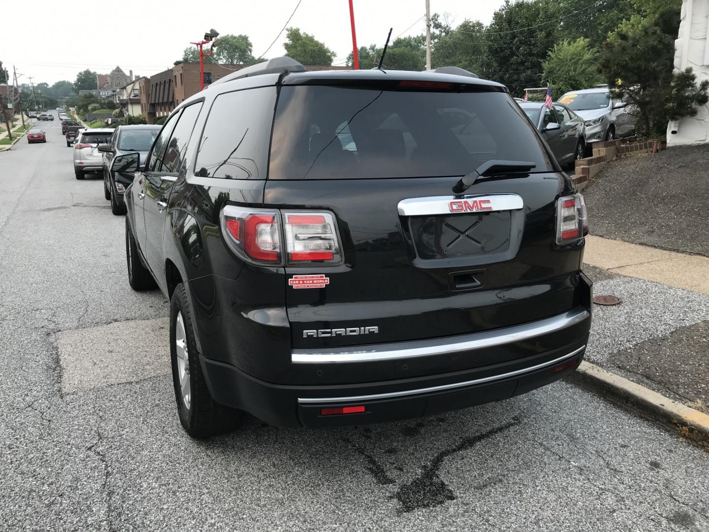 2013 Black /Black GMC Acadia SLE-1 (1GKKRNEDXDJ) with an 3.6L V6 DOHC 24V engine, 6-Speed Automatic transmission, located at 577 Chester Pike, Prospect Park, PA, 19076, (610) 237-1015, 39.886154, -75.302338 - 2013 GMC Acadia SLE 137k miles • 3rd Row Seating. Example Financing: • $2,500 Down • $100 Weekly • $200 Bi-Weekly We finance our own vehicles. We do not obtain or review traditional consumer credit reports. Financing decisions are based on verified income, ability to repay, and our in-- Photo#5