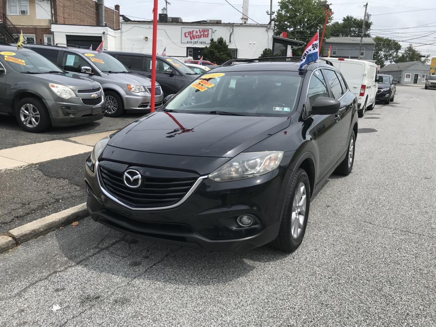 2015 Black /Black Mazda CX-9 Touring AWD (JM3TB3CV5F0) with an 3.7L V6 DOHC 24V engine, 6A transmission, located at 577 Chester Pike, Prospect Park, PA, 19076, (610) 237-1015, 39.886154, -75.302338 - 2015 Mazda CX-9 AWD 133k miles 3rd Row Seating Example Financing: • $3,000 Down • $100 Weekly • $200 Bi-Weekly We finance our own vehicles. We do not obtain or review traditional consumer credit reports. Financing decisions are based on verified income, ability to repay, and our in-house- Photo#2