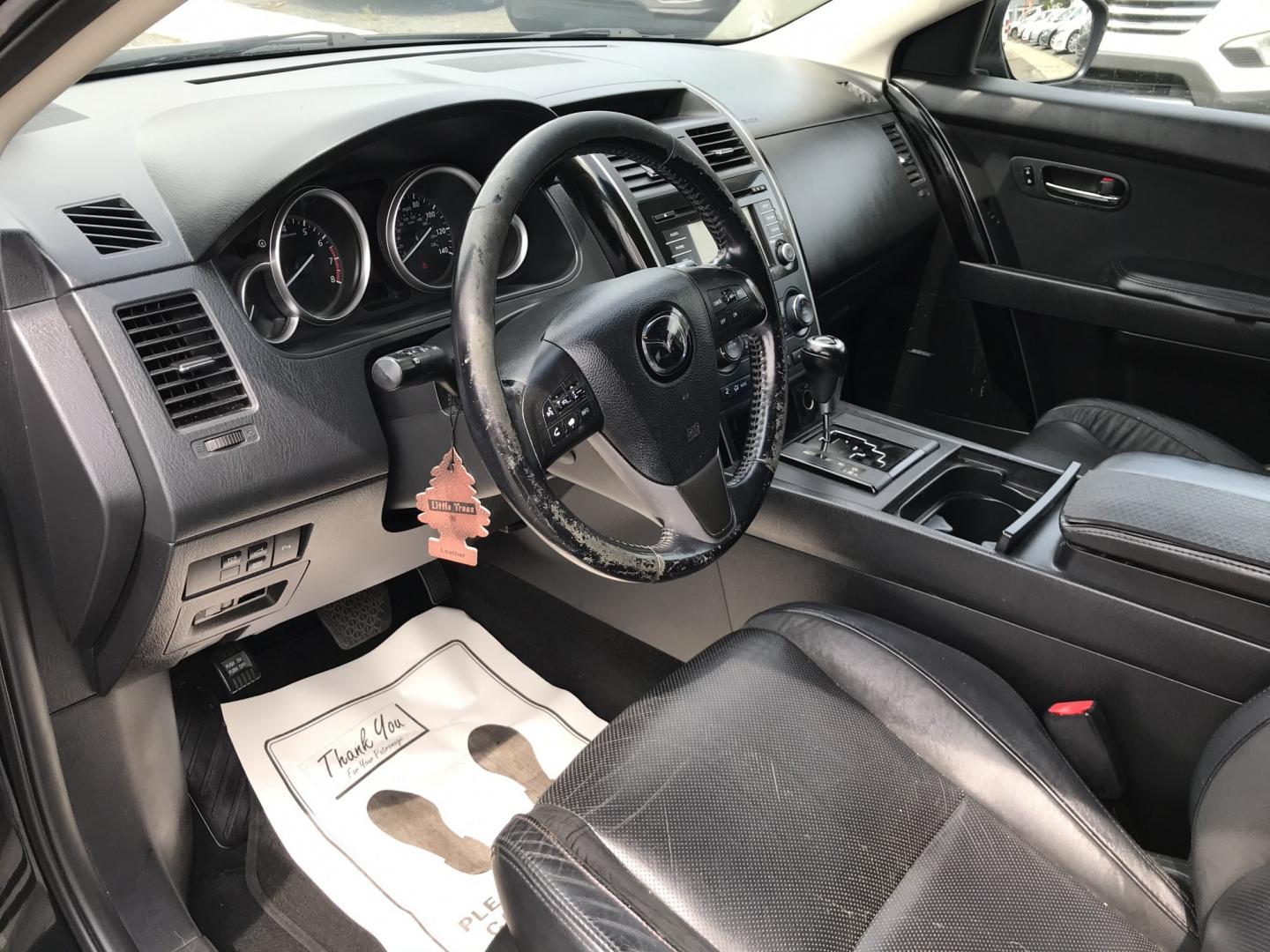 2015 Black /Black Mazda CX-9 Touring AWD (JM3TB3CV5F0) with an 3.7L V6 DOHC 24V engine, 6A transmission, located at 577 Chester Pike, Prospect Park, PA, 19076, (610) 237-1015, 39.886154, -75.302338 - 2015 Mazda CX-9 AWD 133k miles 3rd Row Seating Example Financing: • $3,000 Down • $100 Weekly • $200 Bi-Weekly We finance our own vehicles. We do not obtain or review traditional consumer credit reports. Financing decisions are based on verified income, ability to repay, and our in-house- Photo#12