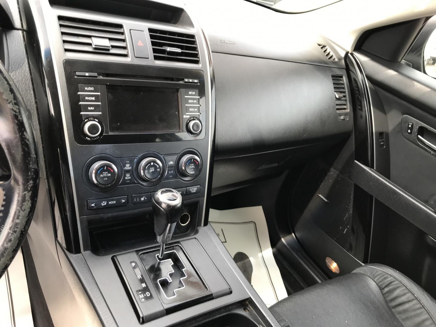 2015 Black /Black Mazda CX-9 Touring AWD (JM3TB3CV5F0) with an 3.7L V6 DOHC 24V engine, 6A transmission, located at 577 Chester Pike, Prospect Park, PA, 19076, (610) 237-1015, 39.886154, -75.302338 - 2015 Mazda CX-9 AWD 133k miles 3rd Row Seating Example Financing: • $3,000 Down • $100 Weekly • $200 Bi-Weekly We finance our own vehicles. We do not obtain or review traditional consumer credit reports. Financing decisions are based on verified income, ability to repay, and our in-house- Photo#14