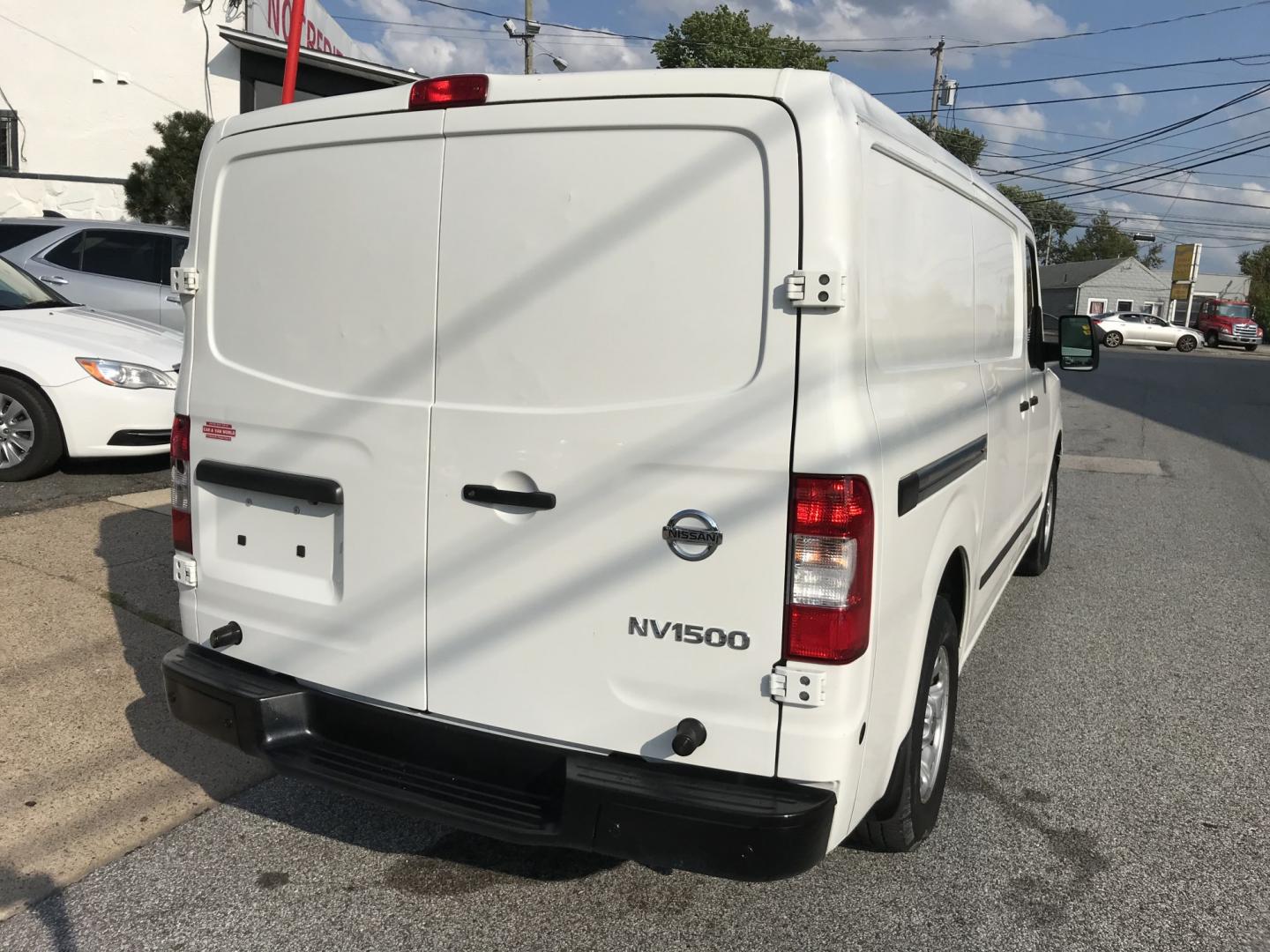 2019 White /Gray Nissan NV Cargo 1500 SV (1N6BF0KM9KN) with an 4.0L V6 engine, 5A transmission, located at 577 Chester Pike, Prospect Park, PA, 19076, (610) 237-1015, 39.886154, -75.302338 - 2019 Nissan NV 1500 Fleet Maintained Shelving Example Financing: • $4,000 Down • $125 Weekly • $250 Bi-Weekly We finance our own vehicles. We do not obtain or review traditional consumer credit reports. Financing decisions are based on verified income, ability to repay, and our in-house- Photo#6