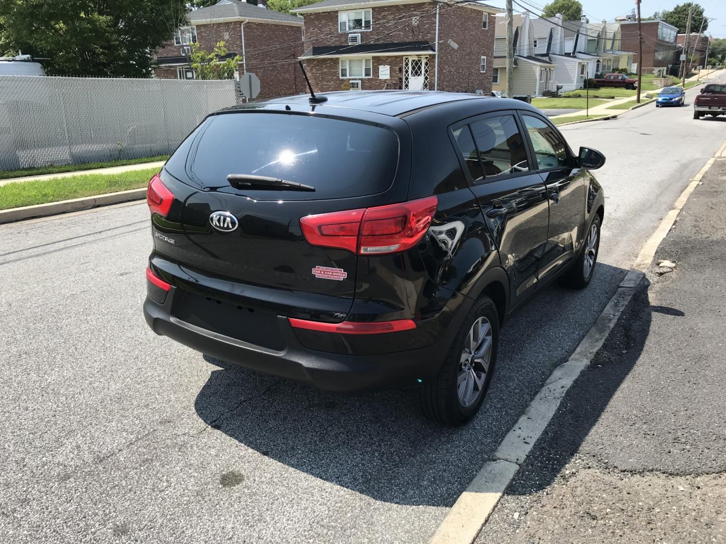 2015 Black /Black Kia Sportage LX AWD (KNDPBCAC0F7) with an 2.4L V6 DOHC 24V engine, 6A transmission, located at 577 Chester Pike, Prospect Park, PA, 19076, (610) 237-1015, 39.886154, -75.302338 - 2015 Kia Sportage LX 92k miles • AWD. Example Financing: • $3,000 Down • $100 Weekly • $200 Bi-Weekly We finance our own vehicles. We do not obtain or review traditional consumer credit reports. Financing decisions are based on verified income, ability to repay, and our in-house underw- Photo#4