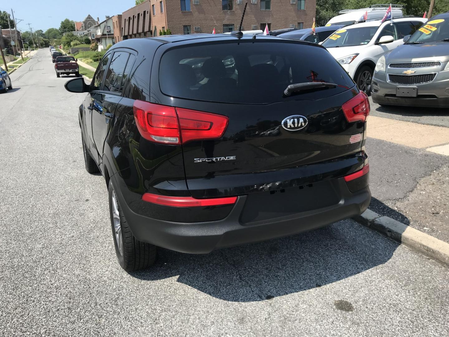 2015 Black /Black Kia Sportage LX AWD (KNDPBCAC0F7) with an 2.4L V6 DOHC 24V engine, 6A transmission, located at 577 Chester Pike, Prospect Park, PA, 19076, (610) 237-1015, 39.886154, -75.302338 - 2015 Kia Sportage LX 92k miles • AWD. Example Financing: • $3,000 Down • $100 Weekly • $200 Bi-Weekly We finance our own vehicles. We do not obtain or review traditional consumer credit reports. Financing decisions are based on verified income, ability to repay, and our in-house underw- Photo#5