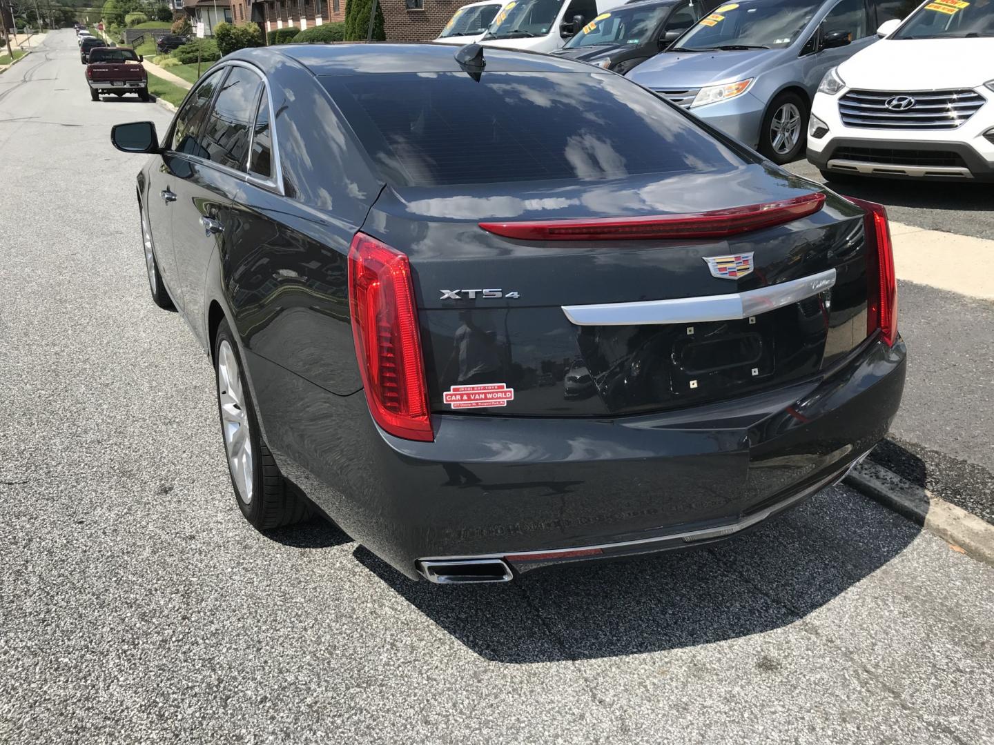 2016 Gray /Beige Cadillac XTS Luxury AWD (2G61N5S30G9) with an 3.6L V6 DOHC 24V engine, 6A transmission, located at 577 Chester Pike, Prospect Park, PA, 19076, (610) 237-1015, 39.886154, -75.302338 - 2016 Cadillac XTS Luxury: Sunroof, AWD, backup camera, new PA inspection, SUPER CLEAN, runs LIKE NEW! This vehicle comes inspected and has been given a bumper to bumper safety check. It is very clean, reliable, and well maintained. We offer a unique pay plan that is known for being the easiest an- Photo#5
