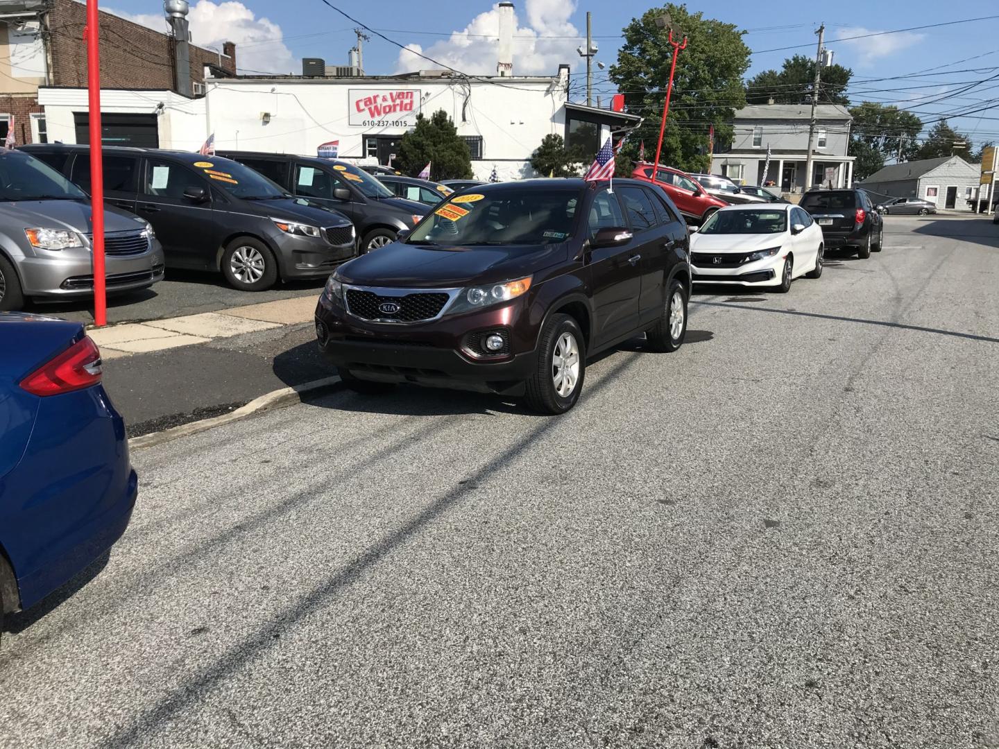 2013 Burgundy Kia Sorento LX (5XYKT4A18DG) with an 2.4L L4 DOHC 16V engine, 6-Speed Automatic transmission, located at 577 Chester Pike, Prospect Park, PA, 19076, (610) 237-1015, 39.886154, -75.302338 - 2013 Kia Sorento LX: Only 94k miles, backup camera, new PA inspection, SUPER CLEAN, runs LIKE NEW! This vehicle comes inspected and has been given a bumper to bumper safety check. It is very clean, reliable, and well maintained. We offer a unique pay plan that is known for being the easiest and f- Photo#1