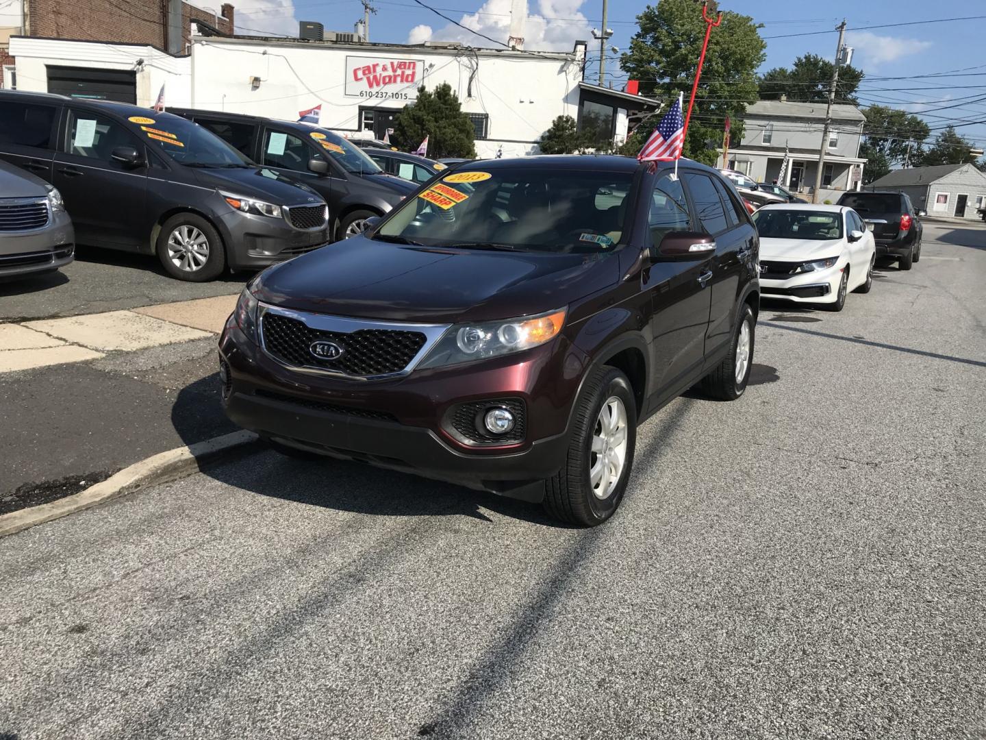 2013 Burgundy Kia Sorento LX (5XYKT4A18DG) with an 2.4L L4 DOHC 16V engine, 6-Speed Automatic transmission, located at 577 Chester Pike, Prospect Park, PA, 19076, (610) 237-1015, 39.886154, -75.302338 - 2013 Kia Sorento LX: Only 94k miles, backup camera, new PA inspection, SUPER CLEAN, runs LIKE NEW! This vehicle comes inspected and has been given a bumper to bumper safety check. It is very clean, reliable, and well maintained. We offer a unique pay plan that is known for being the easiest and f- Photo#2