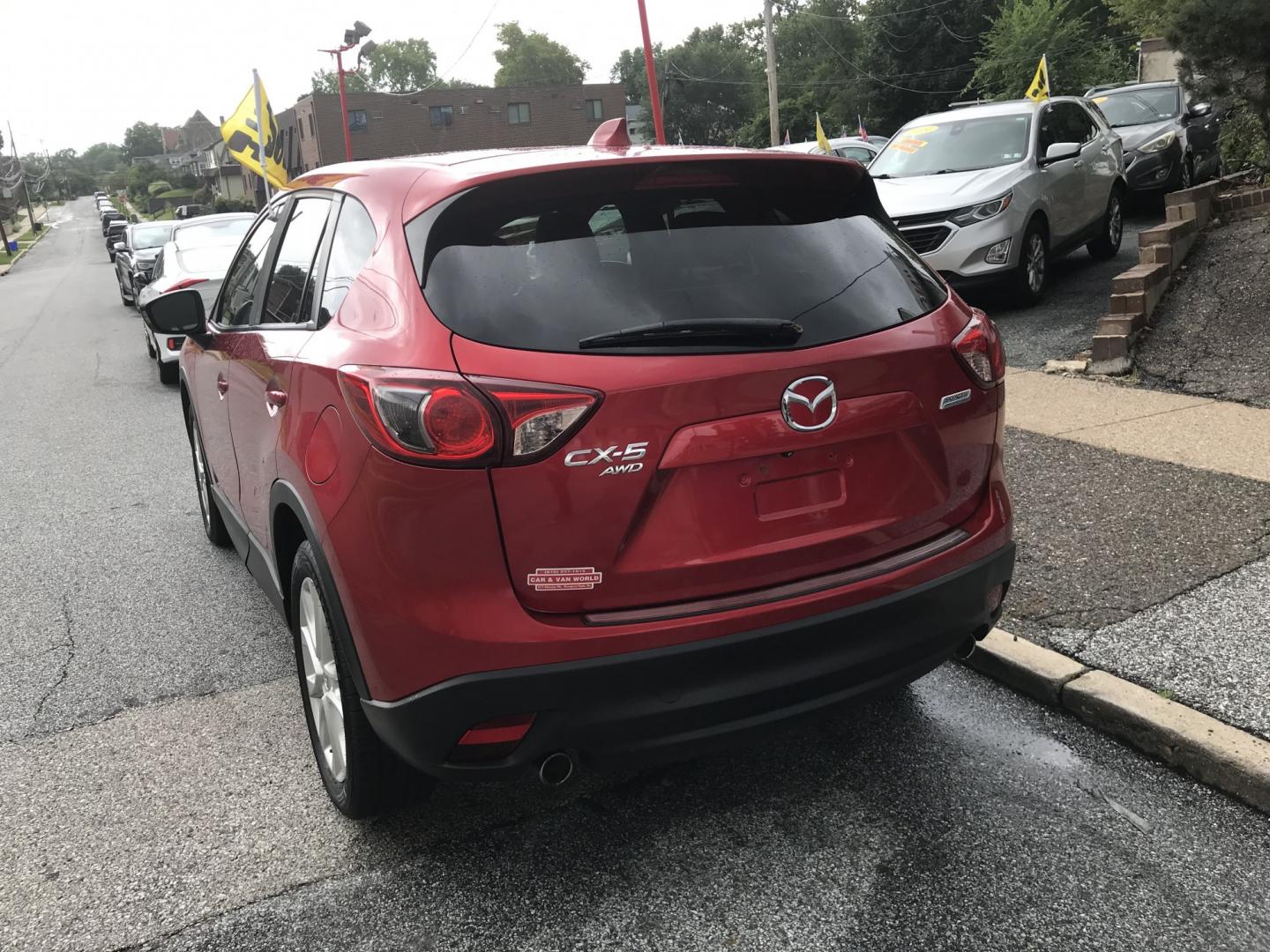 2014 Red /Black Mazda CX-5 Grand Touring AWD (JM3KE4DY3E0) with an 2.5L L4 DOHC 16V engine, 6A transmission, located at 577 Chester Pike, Prospect Park, PA, 19076, (610) 237-1015, 39.886154, -75.302338 - 2014 Mazda CX-5 Grand Touring: AWD, navigation system, backup camera, new PA inspection, SUPER CLEAN, runs LIKE NEW! This vehicle comes inspected and has been given a bumper to bumper safety check. It is very clean, reliable, and well maintained. We offer a unique pay plan that is known for being- Photo#5