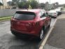 2014 Red /Black Mazda CX-5 Grand Touring AWD (JM3KE4DY3E0) with an 2.5L L4 DOHC 16V engine, 6A transmission, located at 577 Chester Pike, Prospect Park, PA, 19076, (610) 237-1015, 39.886154, -75.302338 - 2014 Mazda CX-5 Grand Touring: AWD, navigation system, backup camera, new PA inspection, SUPER CLEAN, runs LIKE NEW! This vehicle comes inspected and has been given a bumper to bumper safety check. It is very clean, reliable, and well maintained. We offer a unique pay plan that is known for being- Photo#4