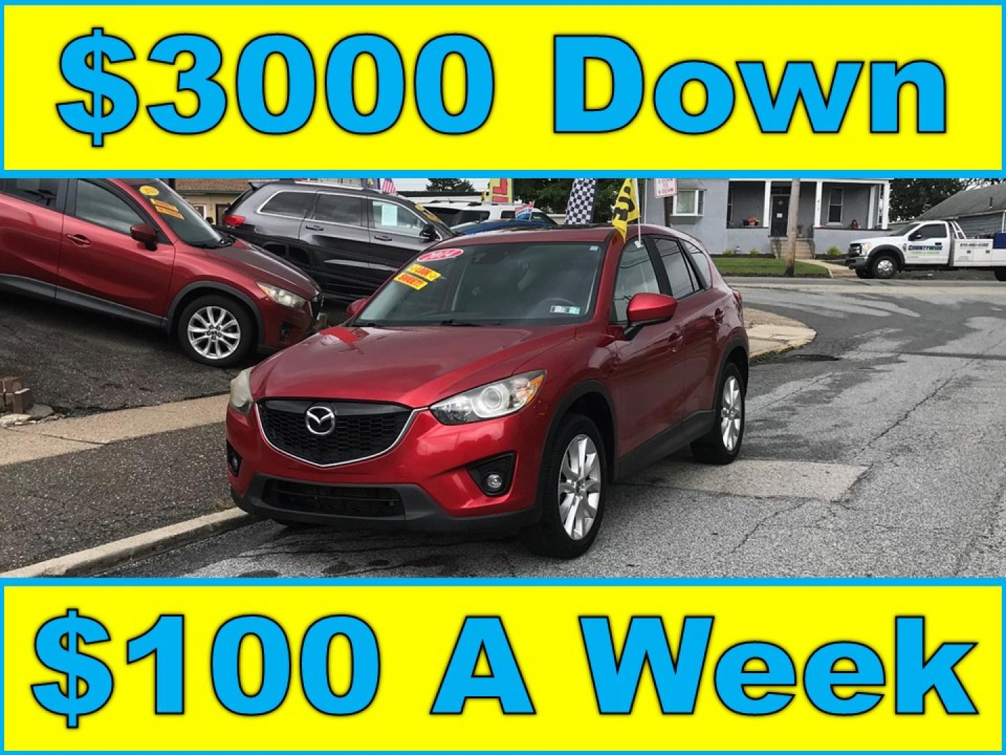 2014 Red /Black Mazda CX-5 Grand Touring AWD (JM3KE4DY3E0) with an 2.5L L4 DOHC 16V engine, 6A transmission, located at 577 Chester Pike, Prospect Park, PA, 19076, (610) 237-1015, 39.886154, -75.302338 - 2014 Mazda CX-5 Grand Touring: AWD, navigation system, backup camera, new PA inspection, SUPER CLEAN, runs LIKE NEW! This vehicle comes inspected and has been given a bumper to bumper safety check. It is very clean, reliable, and well maintained. We offer a unique pay plan that is known for being- Photo#0