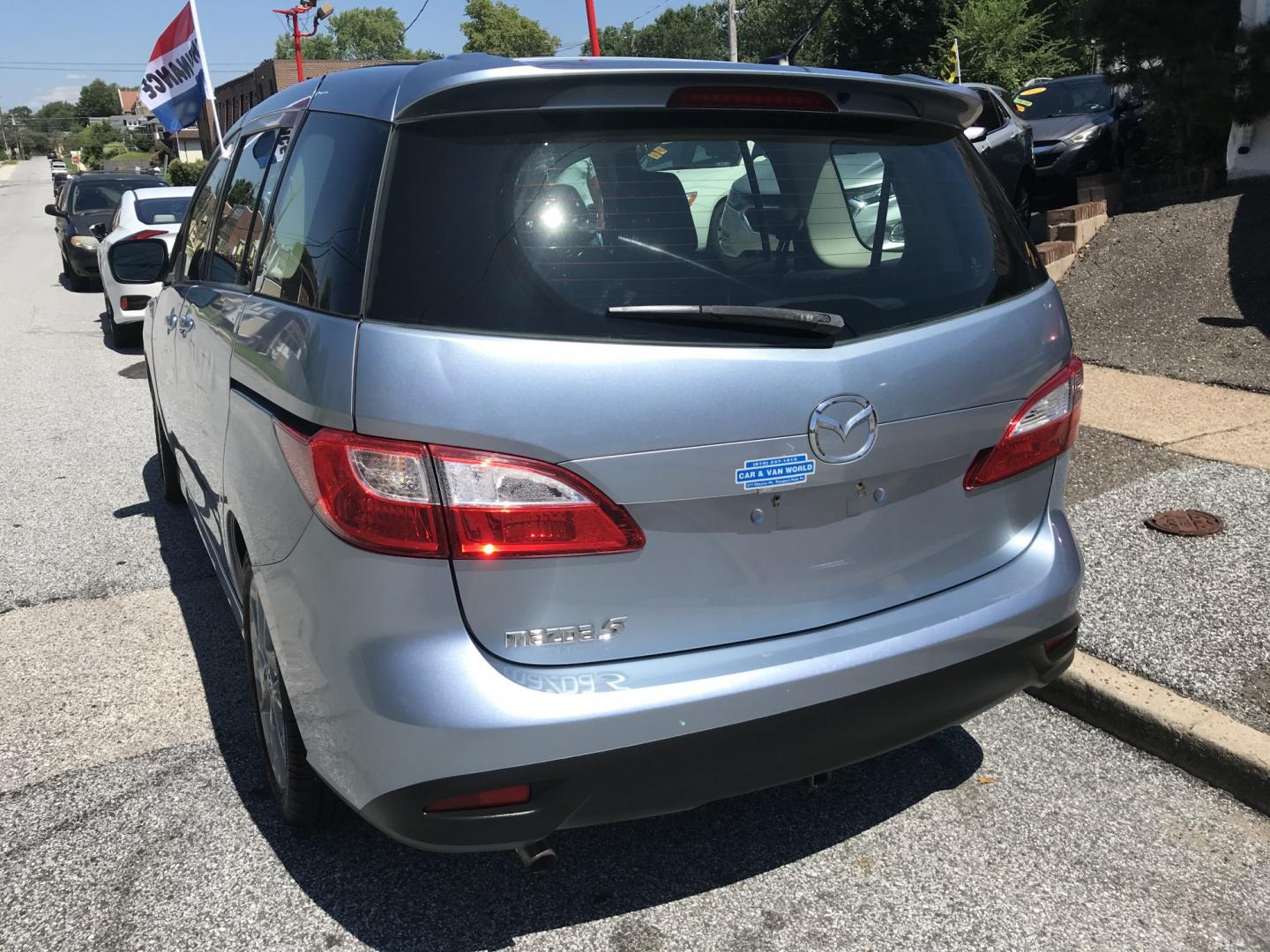 2012 Blue /Gray Mazda MAZDA5 Touring (JM1CW2CL5C0) with an 2.5L L4 DOHC 16V engine, 5-Speed Automatic transmission, located at 577 Chester Pike, Prospect Park, PA, 19076, (610) 237-1015, 39.886154, -75.302338 - 2012 Mazda 5 Touring: 3rd row seating, only 129k miles, new PA inspection, great on gas, runs LIKE NEW! This vehicle comes inspected and has been given a bumper to bumper safety check. It is very clean, reliable, and well maintained. We offer a unique pay plan that is known for being the easiest- Photo#5