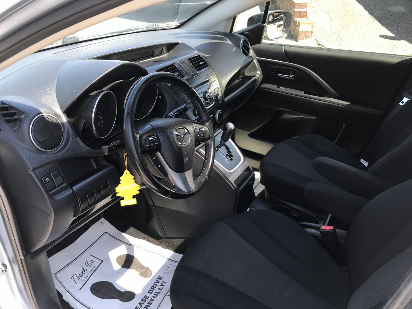 2012 Blue /Gray Mazda MAZDA5 Touring (JM1CW2CL5C0) with an 2.5L L4 DOHC 16V engine, 5-Speed Automatic transmission, located at 577 Chester Pike, Prospect Park, PA, 19076, (610) 237-1015, 39.886154, -75.302338 - 2012 Mazda 5 Touring: 3rd row seating, only 129k miles, new PA inspection, great on gas, runs LIKE NEW! This vehicle comes inspected and has been given a bumper to bumper safety check. It is very clean, reliable, and well maintained. We offer a unique pay plan that is known for being the easiest- Photo#7