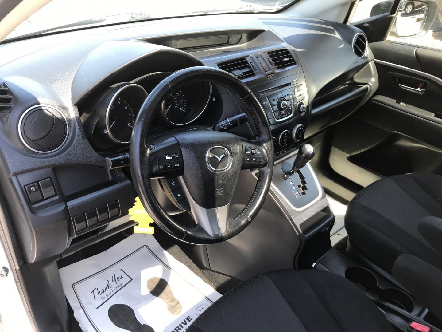 2012 Blue /Gray Mazda MAZDA5 Touring (JM1CW2CL5C0) with an 2.5L L4 DOHC 16V engine, 5-Speed Automatic transmission, located at 577 Chester Pike, Prospect Park, PA, 19076, (610) 237-1015, 39.886154, -75.302338 - 2012 Mazda 5 Touring: 3rd row seating, only 129k miles, new PA inspection, great on gas, runs LIKE NEW! This vehicle comes inspected and has been given a bumper to bumper safety check. It is very clean, reliable, and well maintained. We offer a unique pay plan that is known for being the easiest- Photo#10
